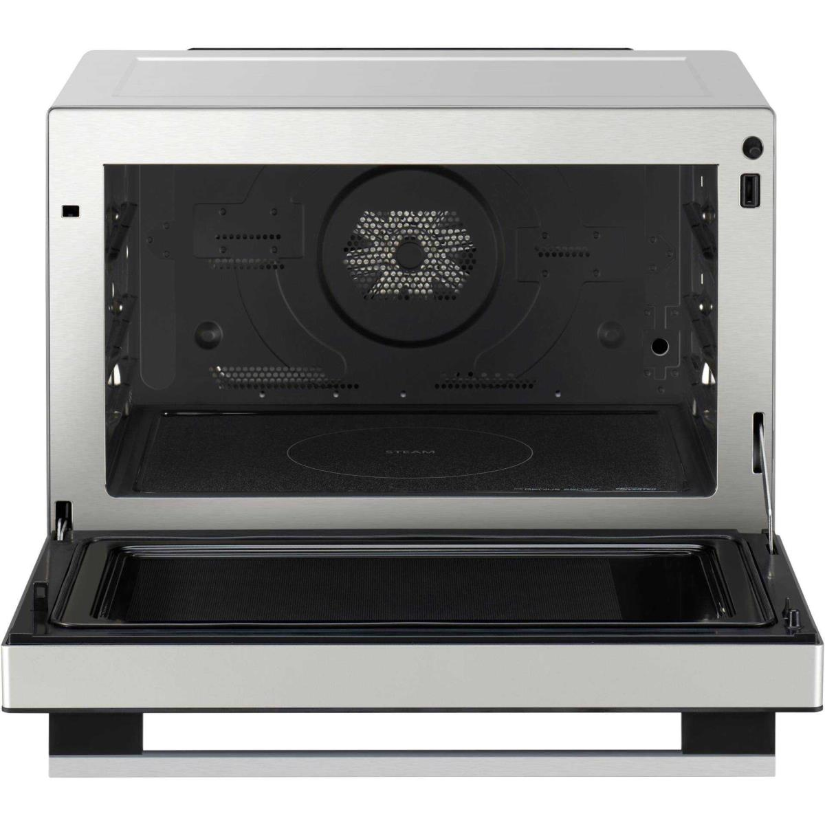 Mikrofalówka ze stali nierdzewnej z otwartymi drzwiami, pokazująca wnętrze.