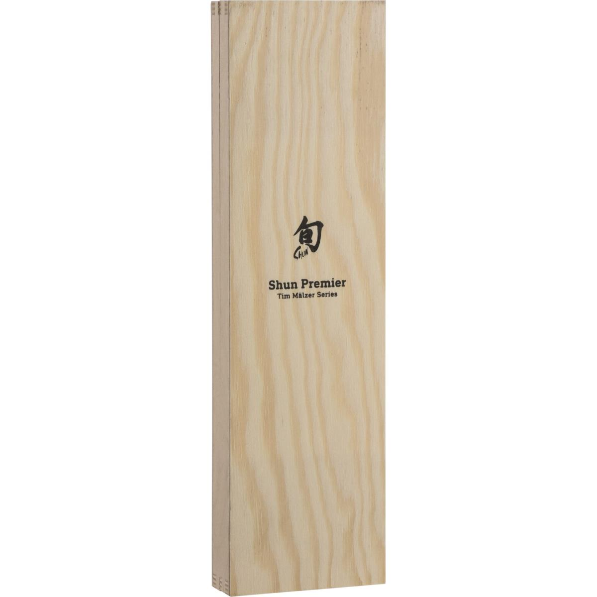 Drewniane pudełko z logo i tekstem, prawdopodobnie na zestaw noży, na białym tle.