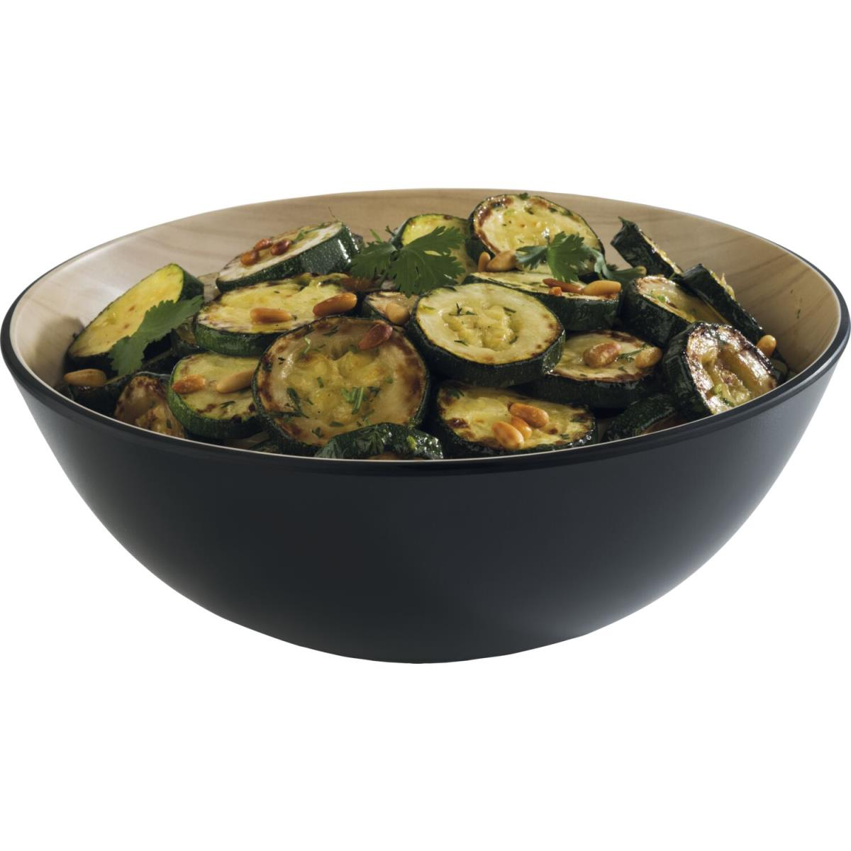 Eine Schüssel mit Zucchinischeiben mit Pinienkernen. Die Schüssel ist schwarz.