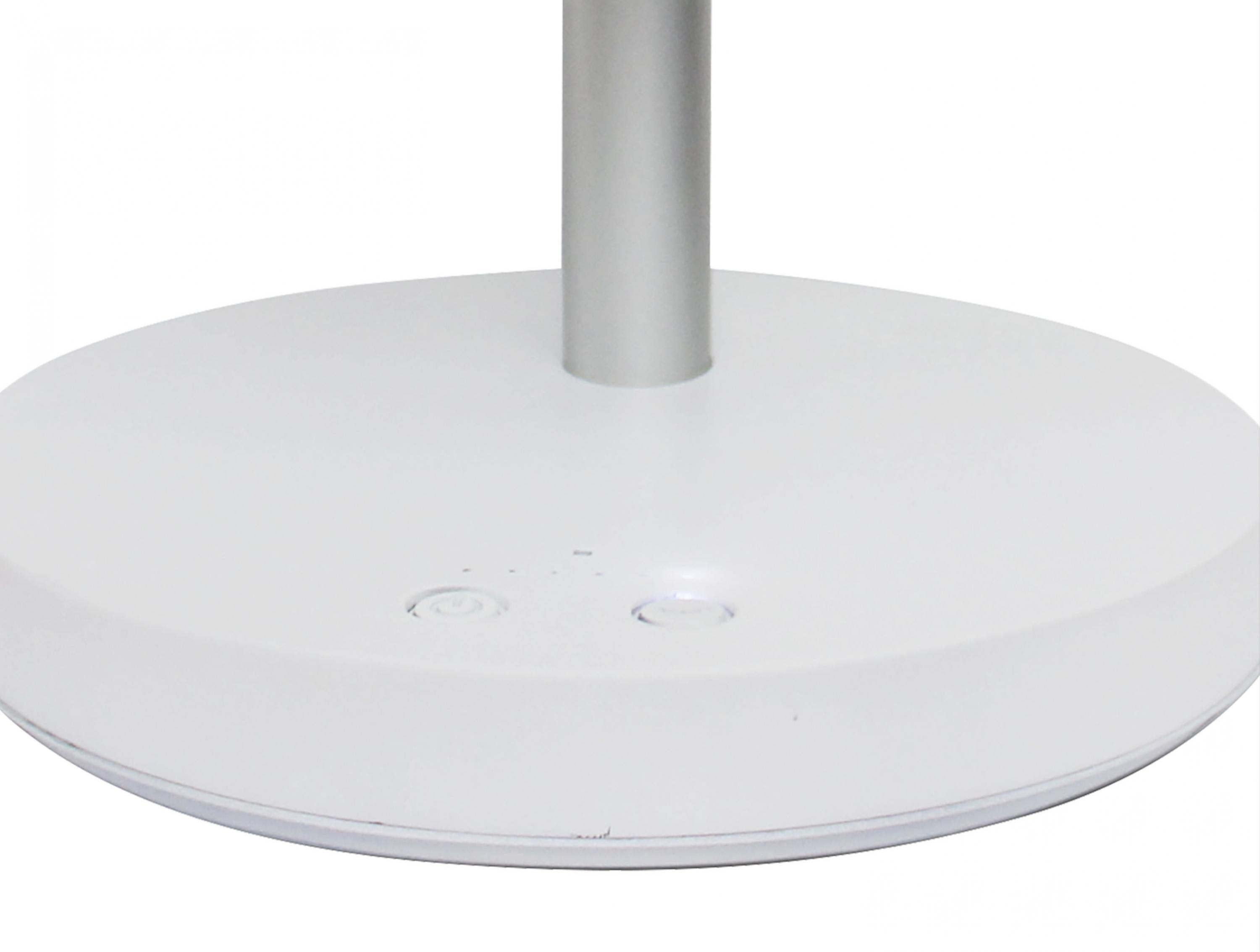 La base di una lampada bianca con pulsanti di accensione e touch.