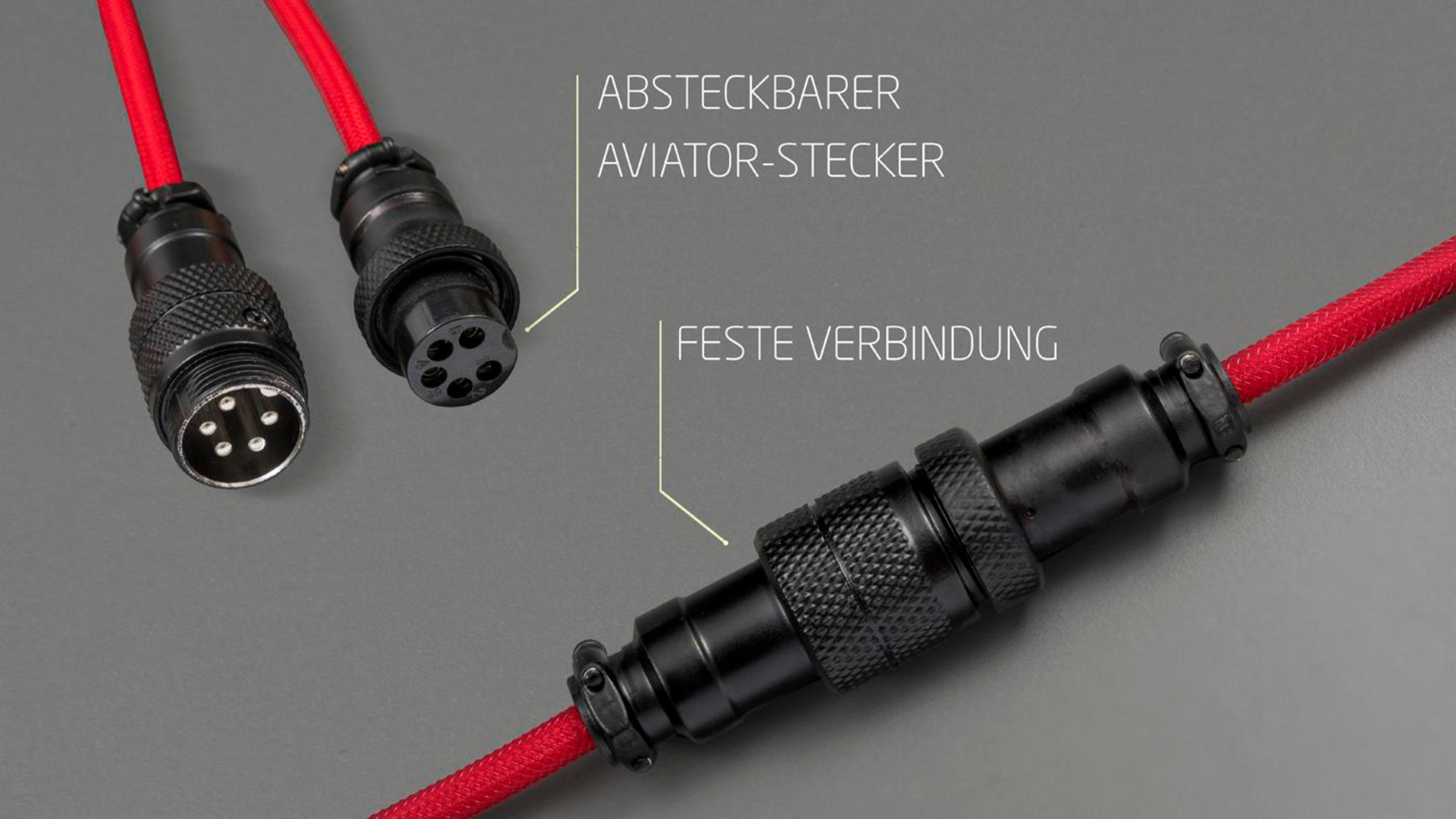 Nahaufnahme eines roten Kabels mit schwarzen Steckern. Text zeigt abnehmbaren Aviator-Stecker.