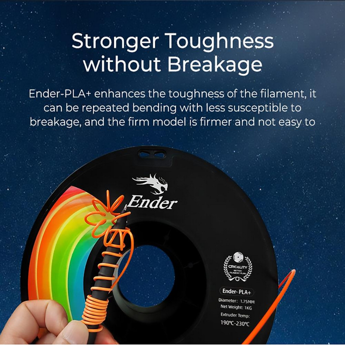 Czarna szpula filamentu Ender-PLA+. Widoczny tekst o filamencie i pomarańczowy filament.