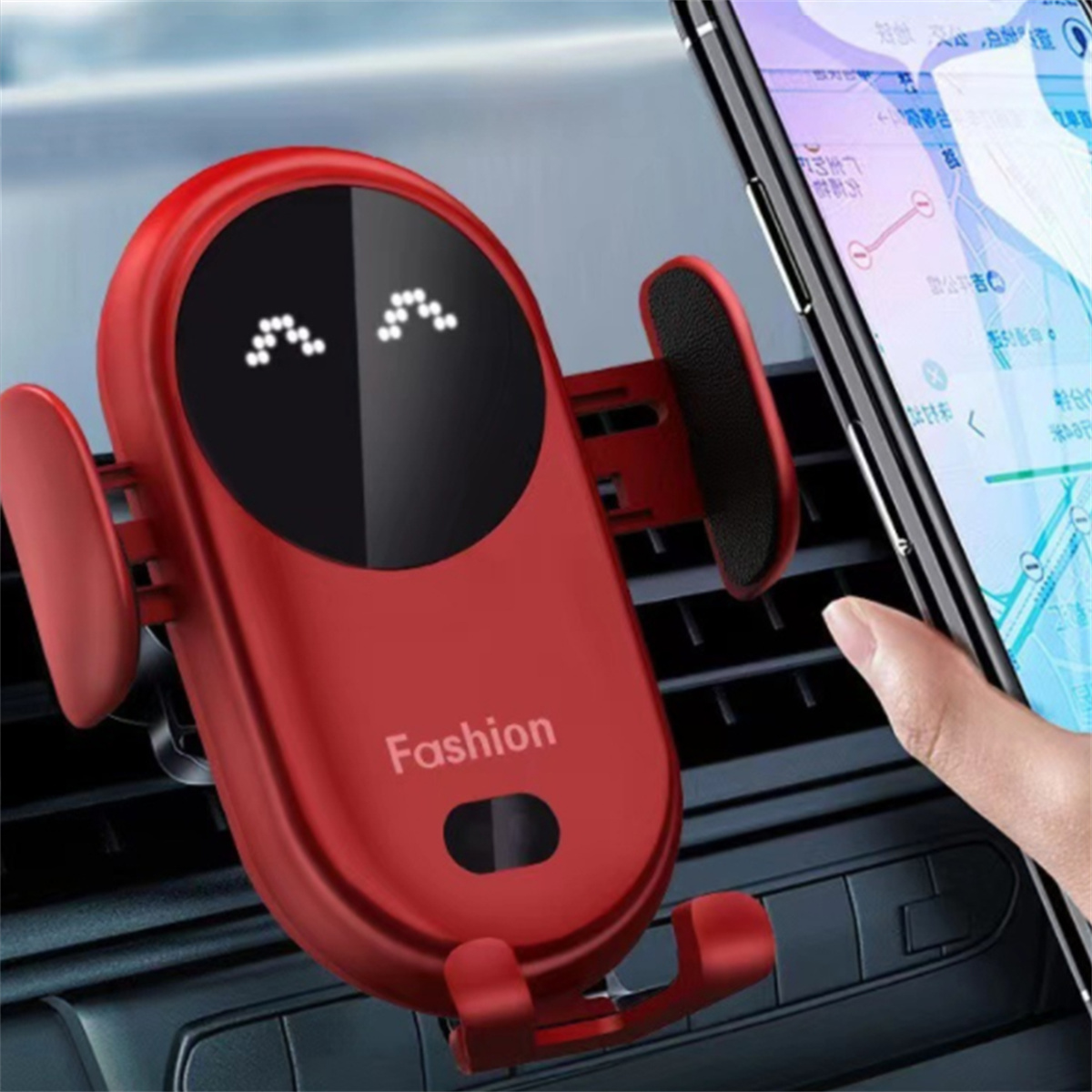 Ein roter Autotelefonhalter mit einem lächelnden Gesicht, der ein Smartphone hält.