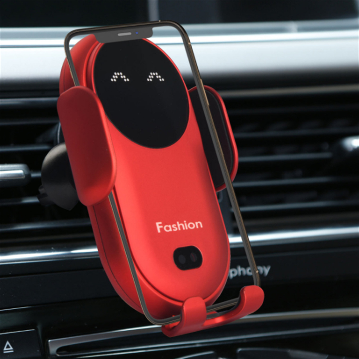 Ein roter Telefonhalter für ein Auto. Er hat einen Bildschirm und das Wort 'Fashion' darauf.
