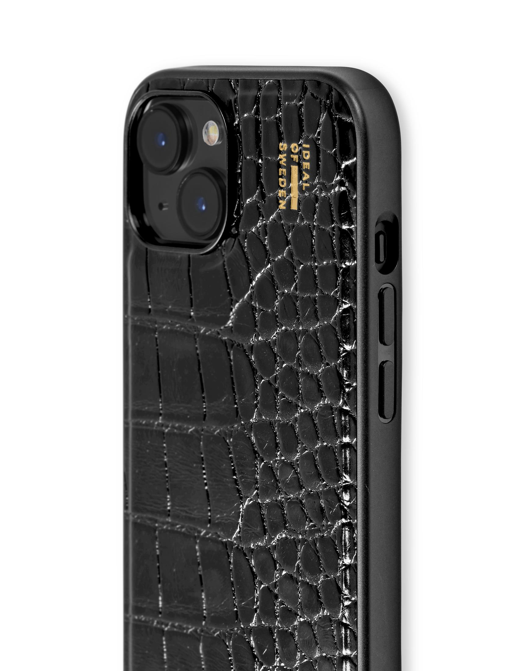 Schwarze Handyhülle mit Krokodiltextur und schwarzer Kamera.