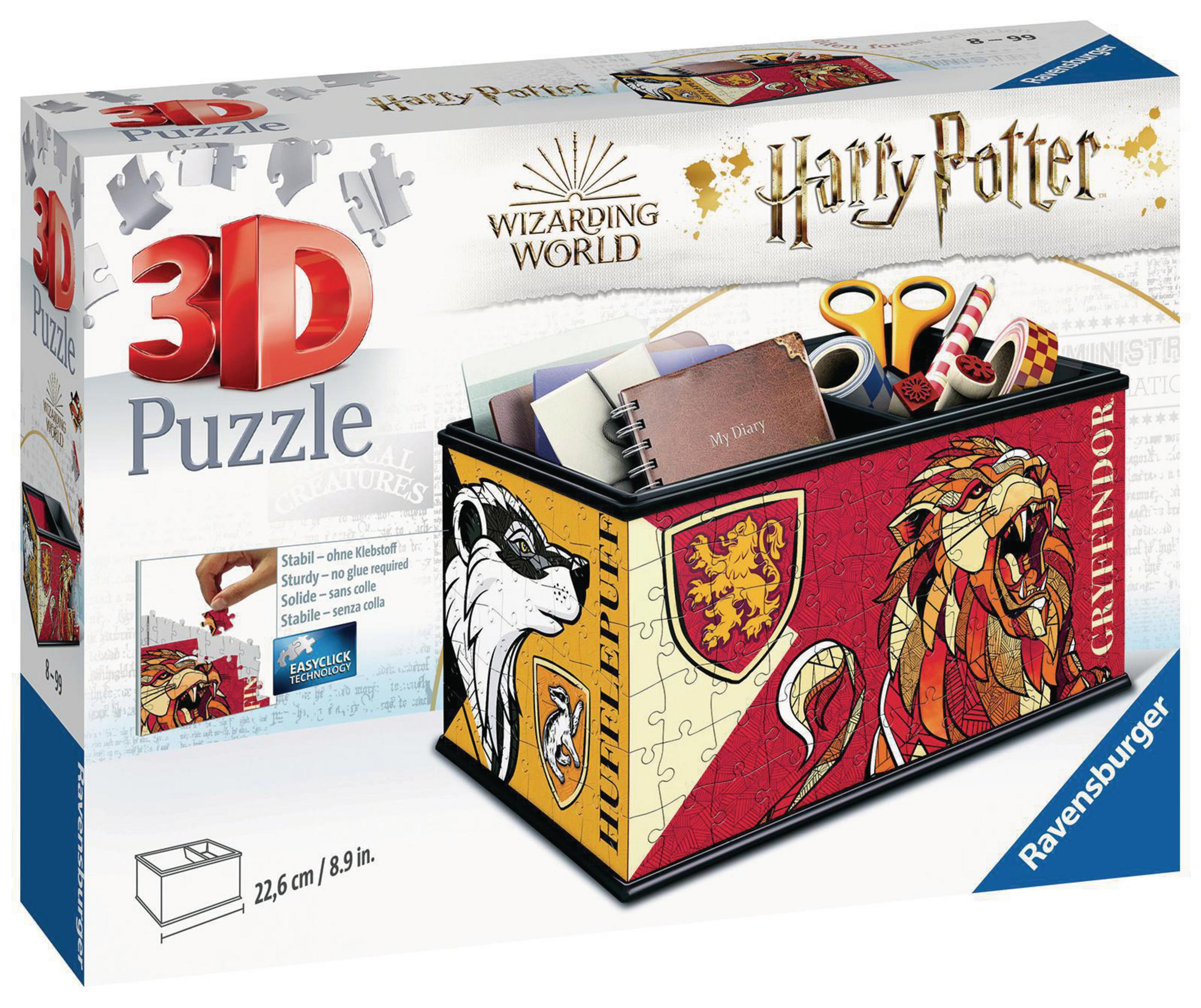 Pudełko z puzzlami 3D Harry'ego Pottera. Pudełko to kostka z herbem Gryffindoru.