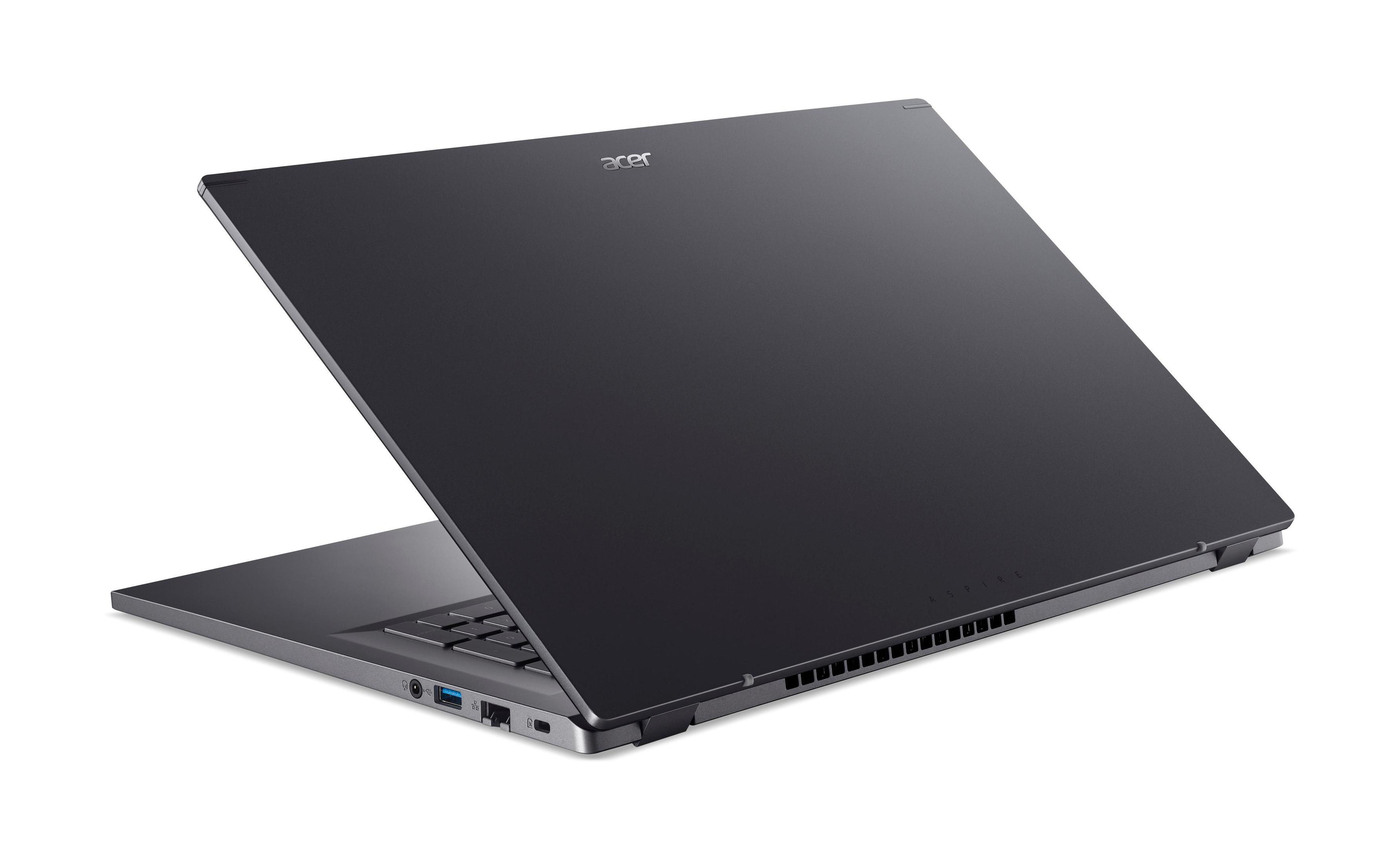 Ein dunkelgrauer Acer Laptop, leicht geöffnet, der Bildschirm ist vom Betrachter abgewandt, auf weißem Untergrund.