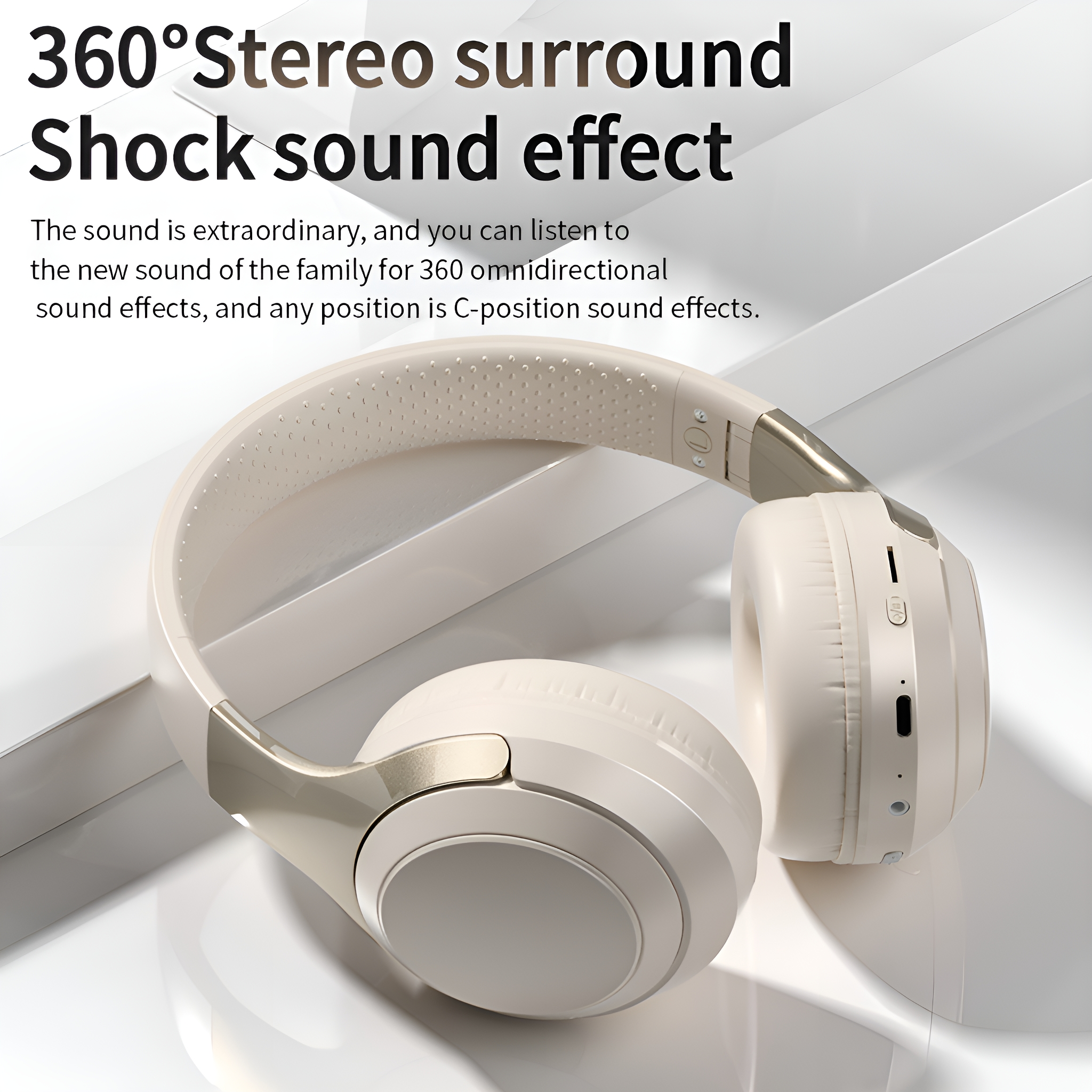 Weiße Kopfhörer mit beigem Kopfbügel. Auf den Kopfhörern steht '360°Stereo surround'.