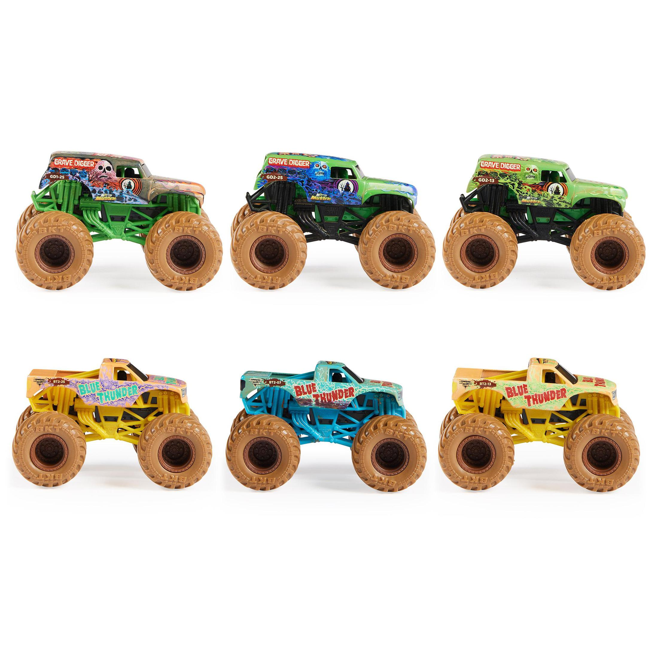Sechs Spielzeug-Monster-Trucks, zwei Reihen mit drei. Die Trucks sind grün, blau, gelb und orange.