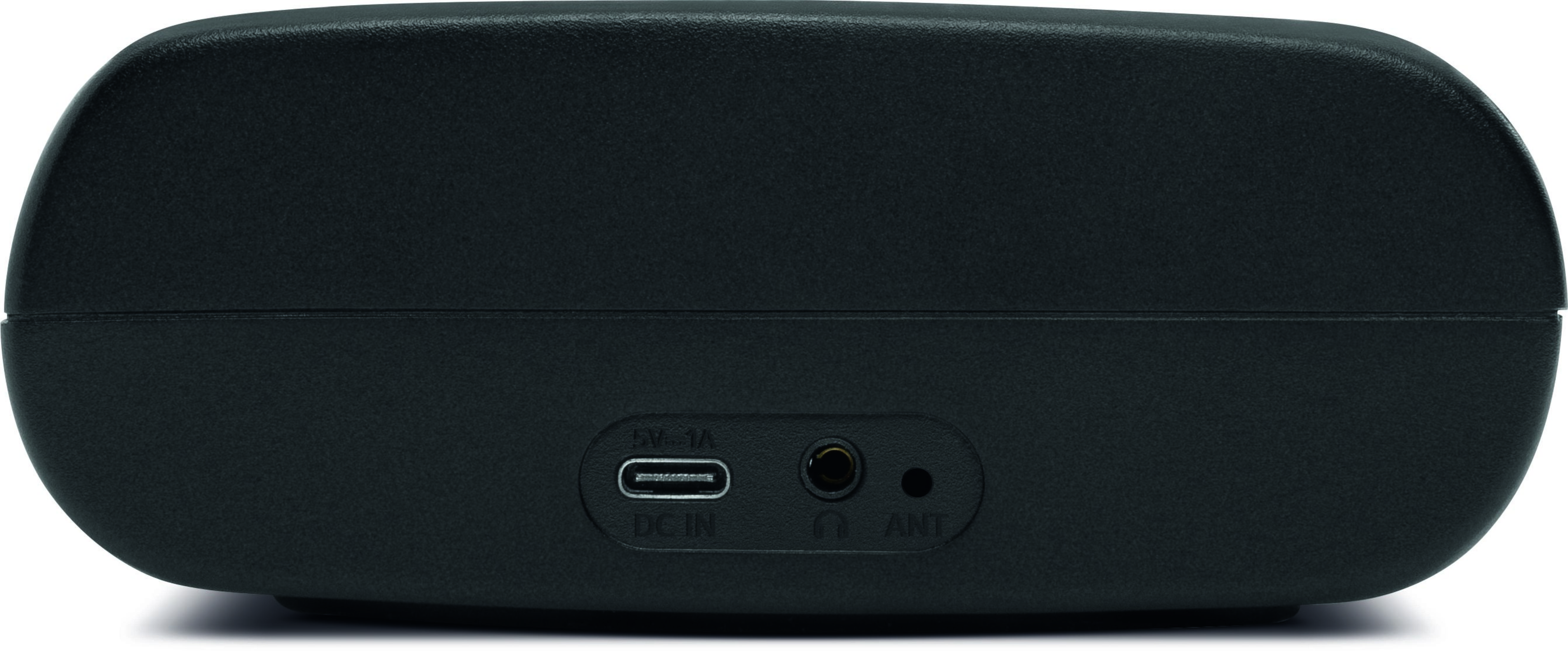 Tył czarnego głośnika z portami. Posiada port USB, port aux i port antenowy.