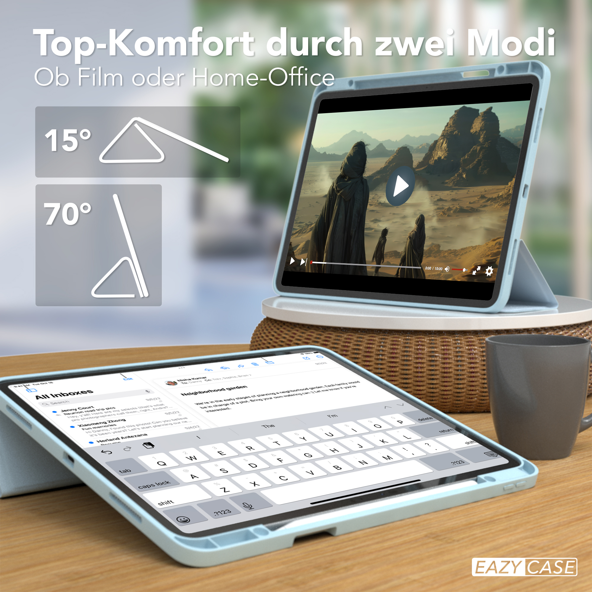 Tablet mit Tastaturhülle. Der Bildschirm zeigt ein Video und einen E-Mail-Posteingang. Auf dem Tisch steht eine Tasse.