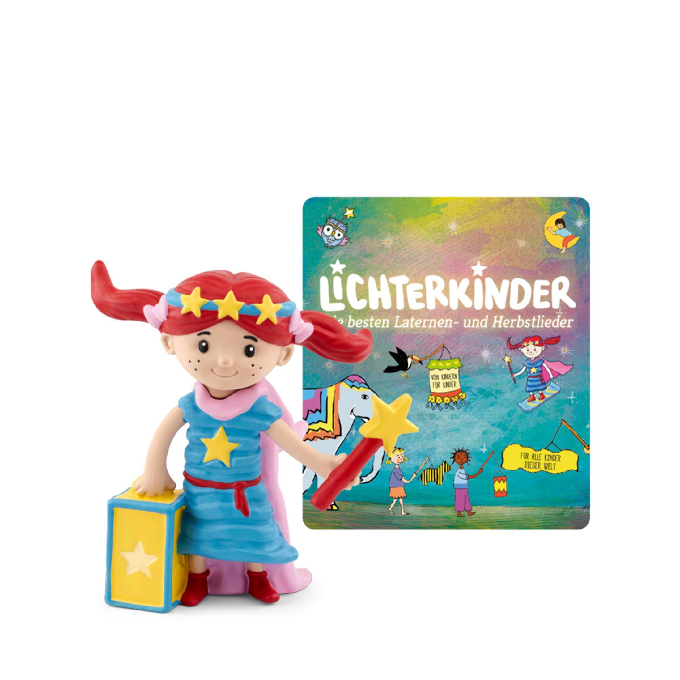 Kinderspielzeug mit einer Mädchenfigur, einer Box und einem Buch. Weißer Hintergrund.