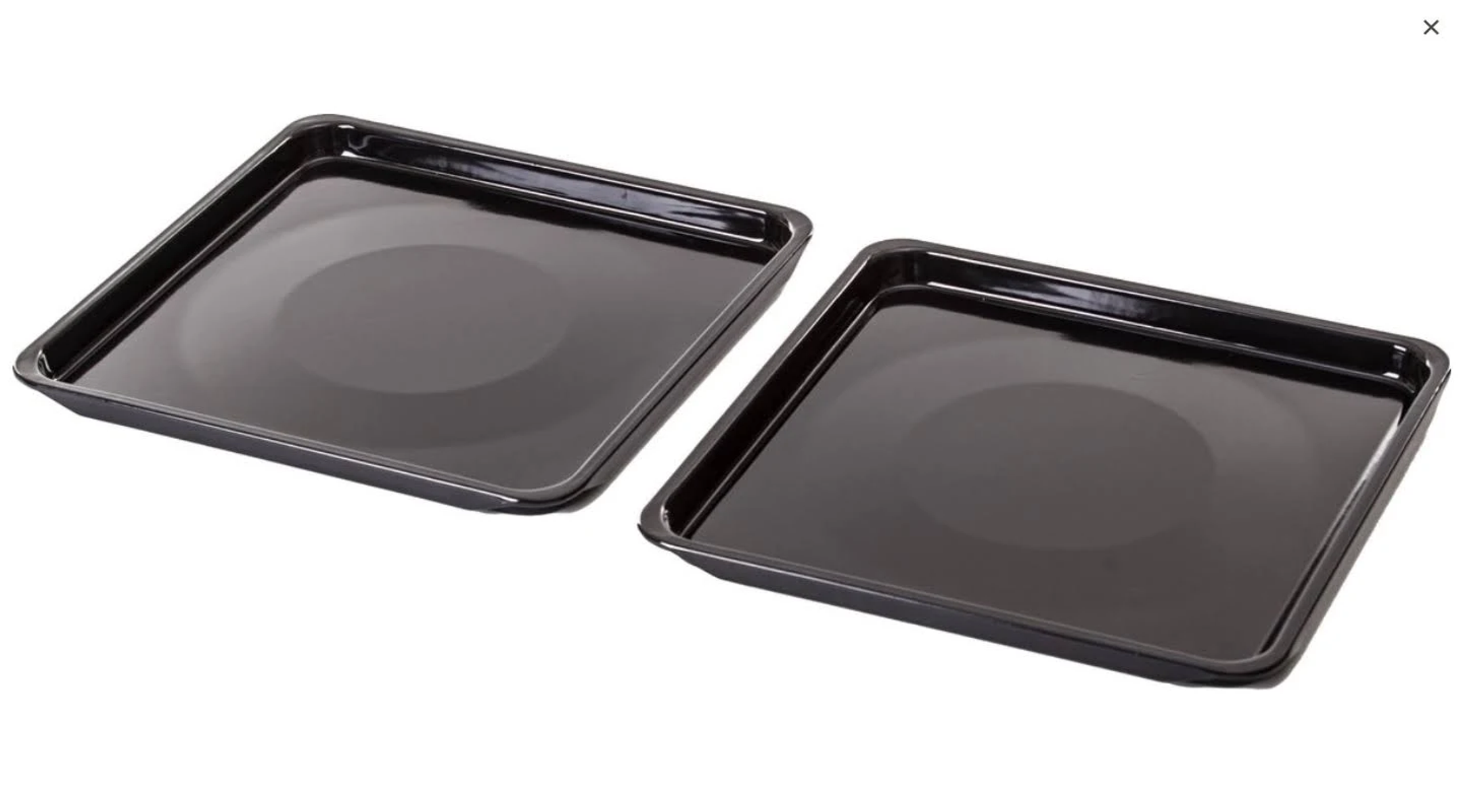Two black oven trays, rectangular, on a white background, reflecting light.