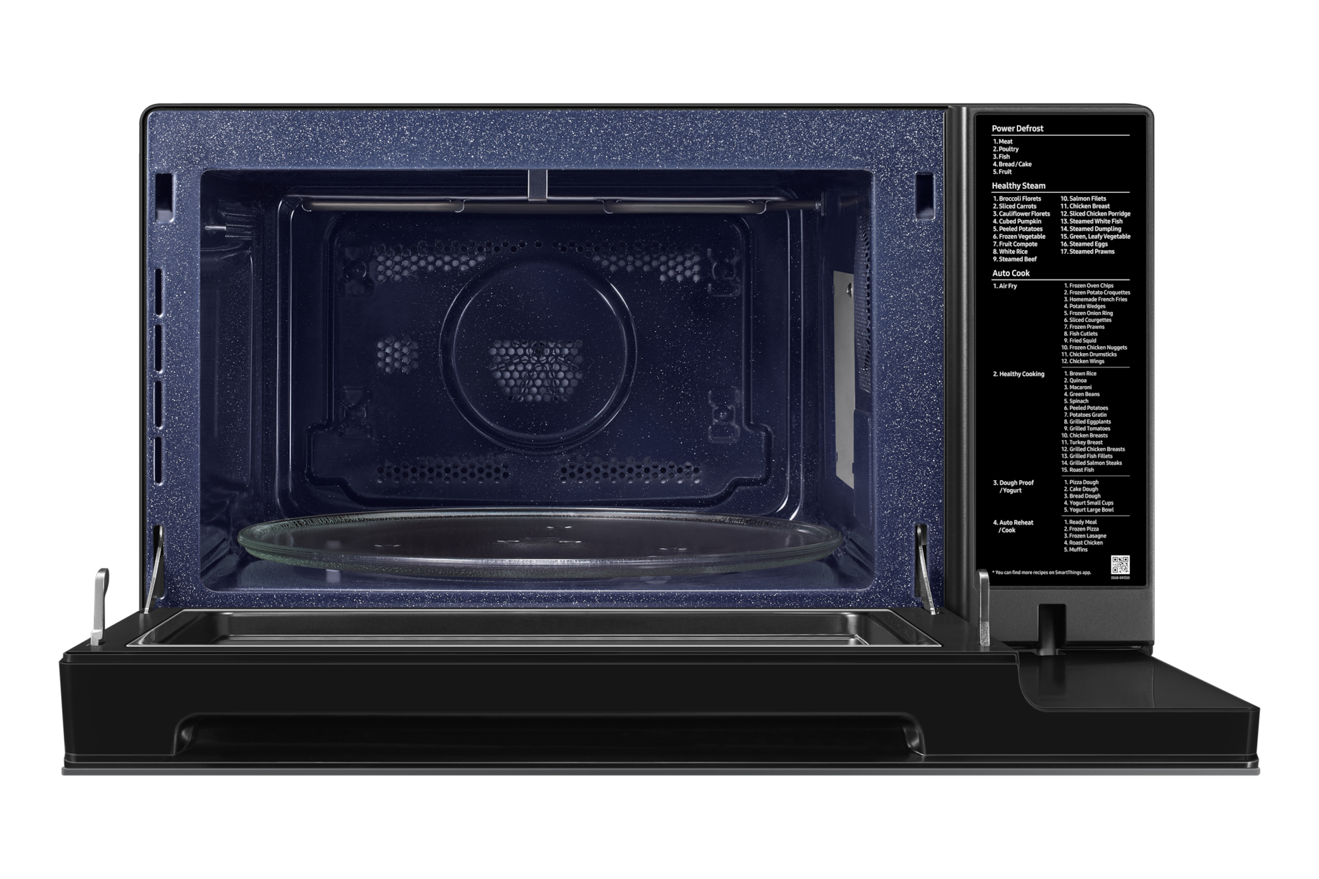 Microwave interior with open door, glass plate, and a control panel with cooking options.