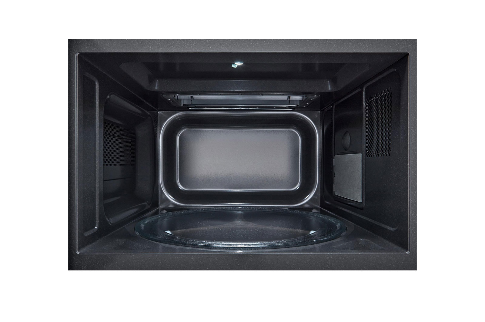 Vista interna di un forno a microonde nero con piatto girevole in vetro.