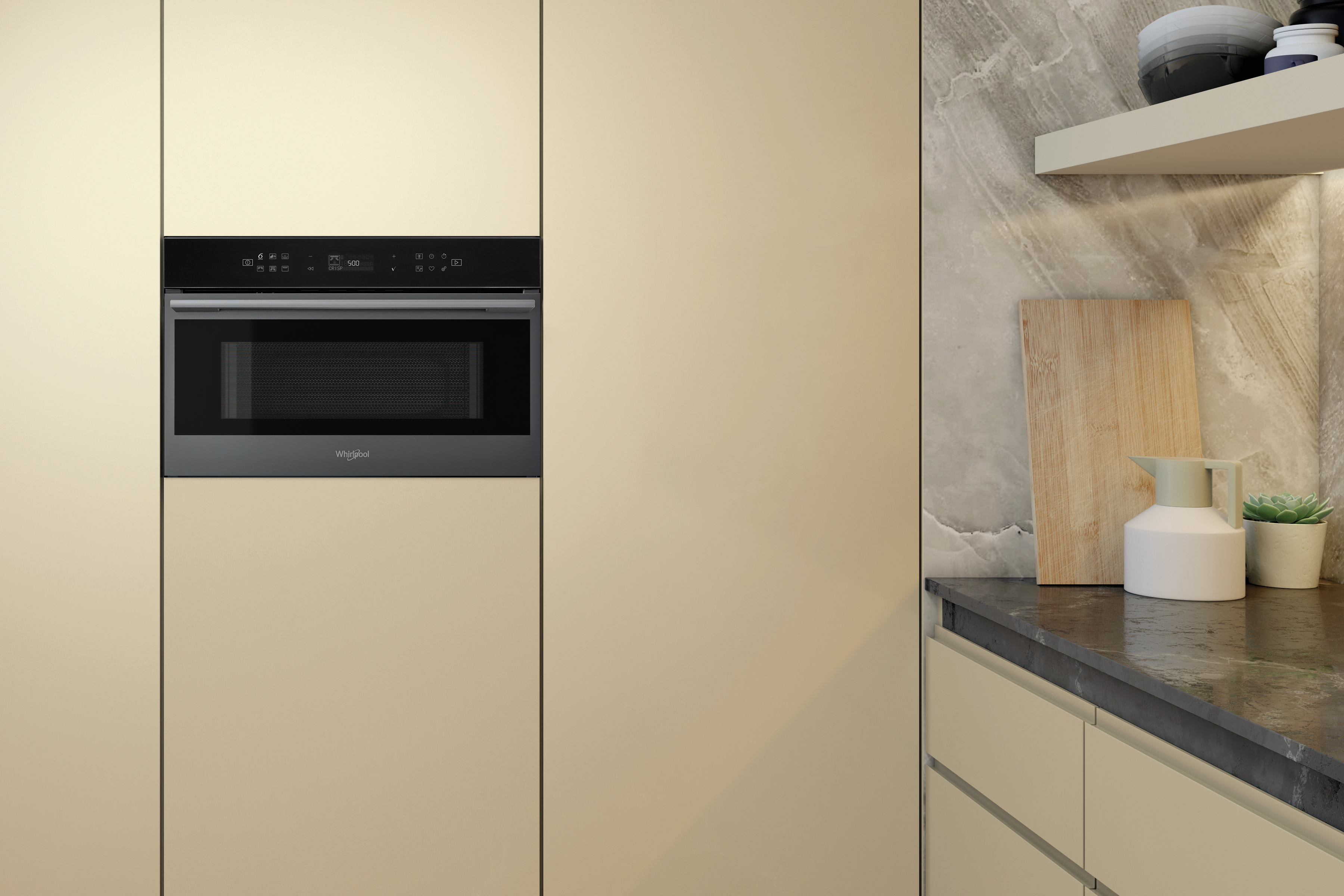 Un forno a microonde a incasso in una cucina moderna.