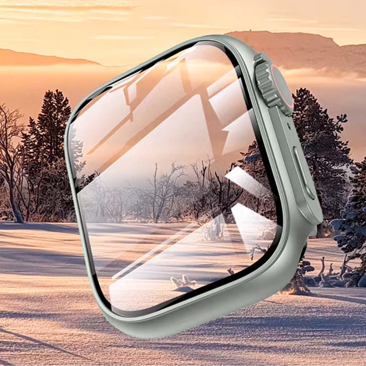 Srebrny smartwatch z ochraniaczem ekranu, na tle zaśnieżonych gór.