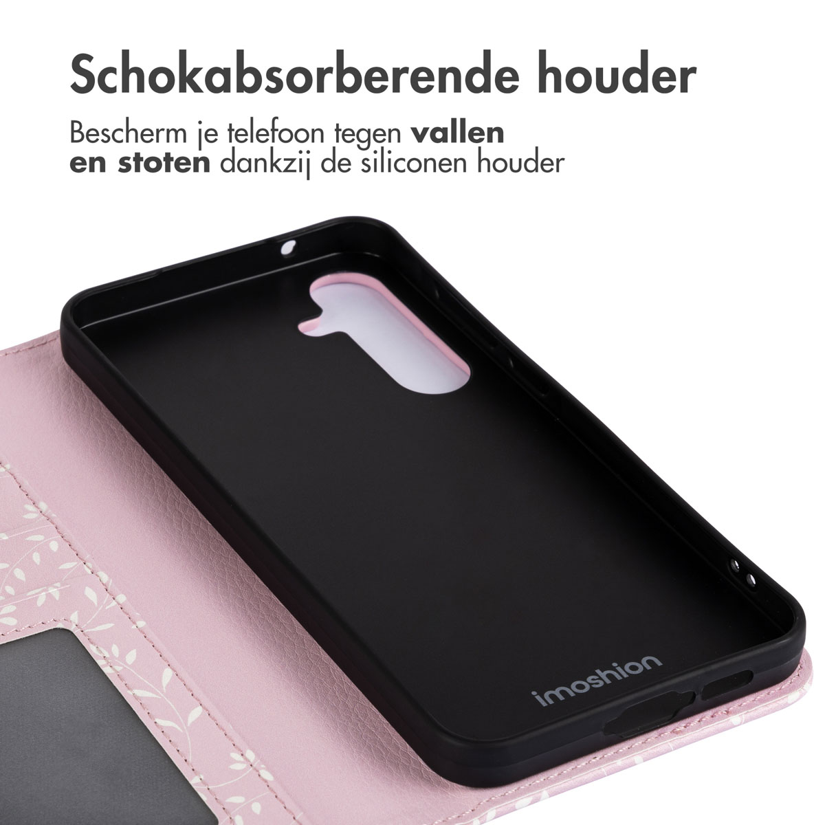 Binnenkant van telefoonhoesje met zwarte houder, roze bloemenpatroon. Tekst: Schokabsorberende houder.
