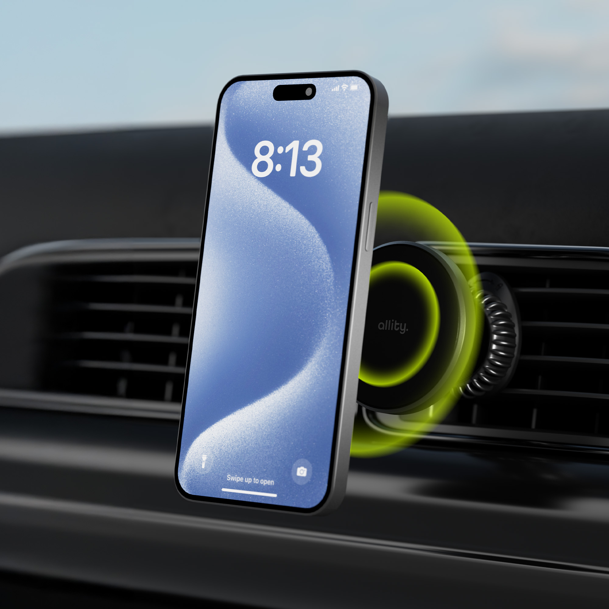 Telefon zamontowany na wentylacji samochodowej z magnetycznym uchwytem, pokazujący godzinę 8:13 na ekranie.