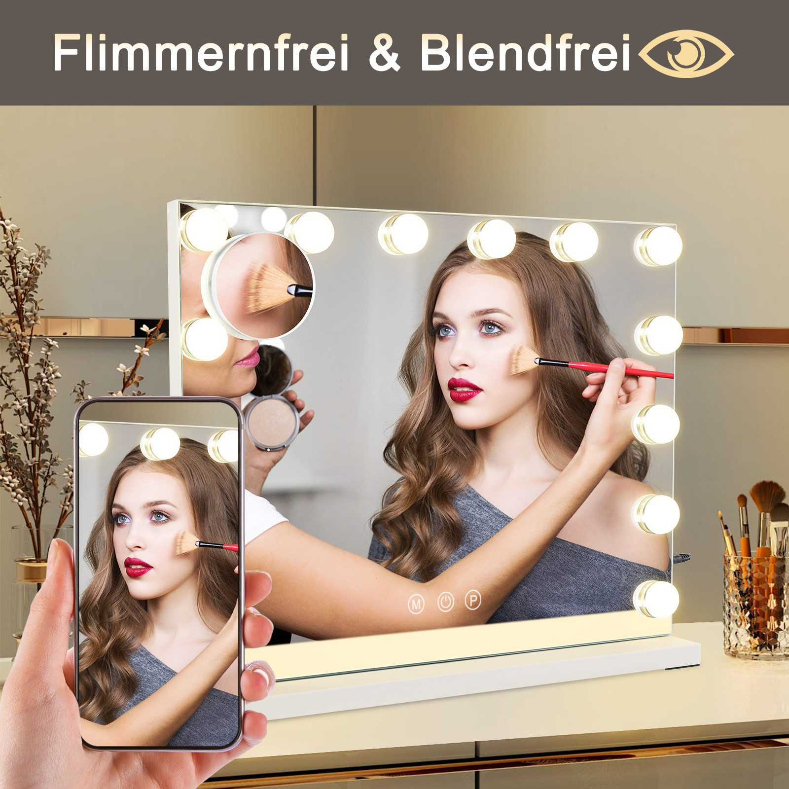 Mujer maquillándose frente a espejo iluminado. Teléfono muestra la imagen. Se ven brochas de maquillaje.