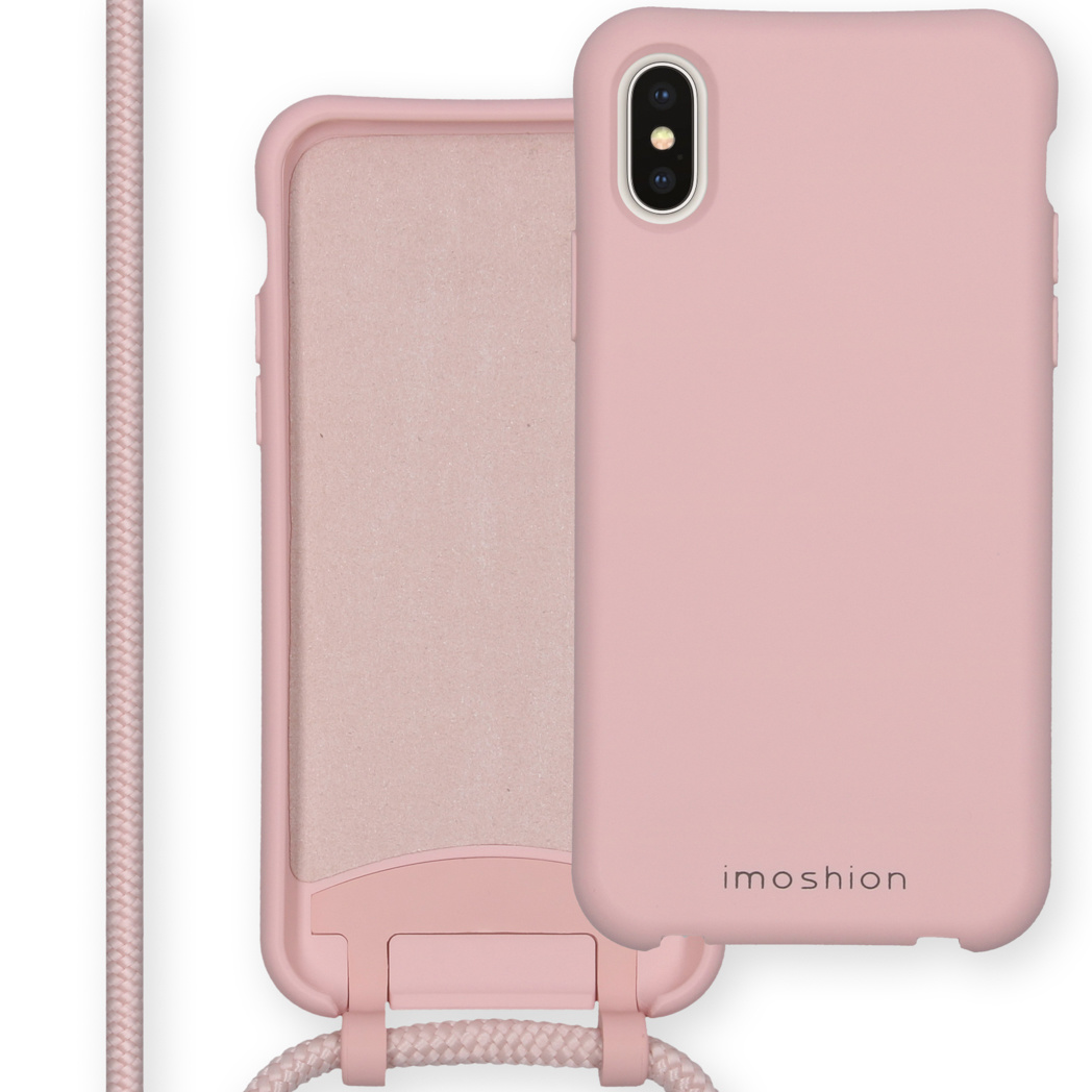 Coque de téléphone rose avec lanière. Marque Imoshion sur la coque.