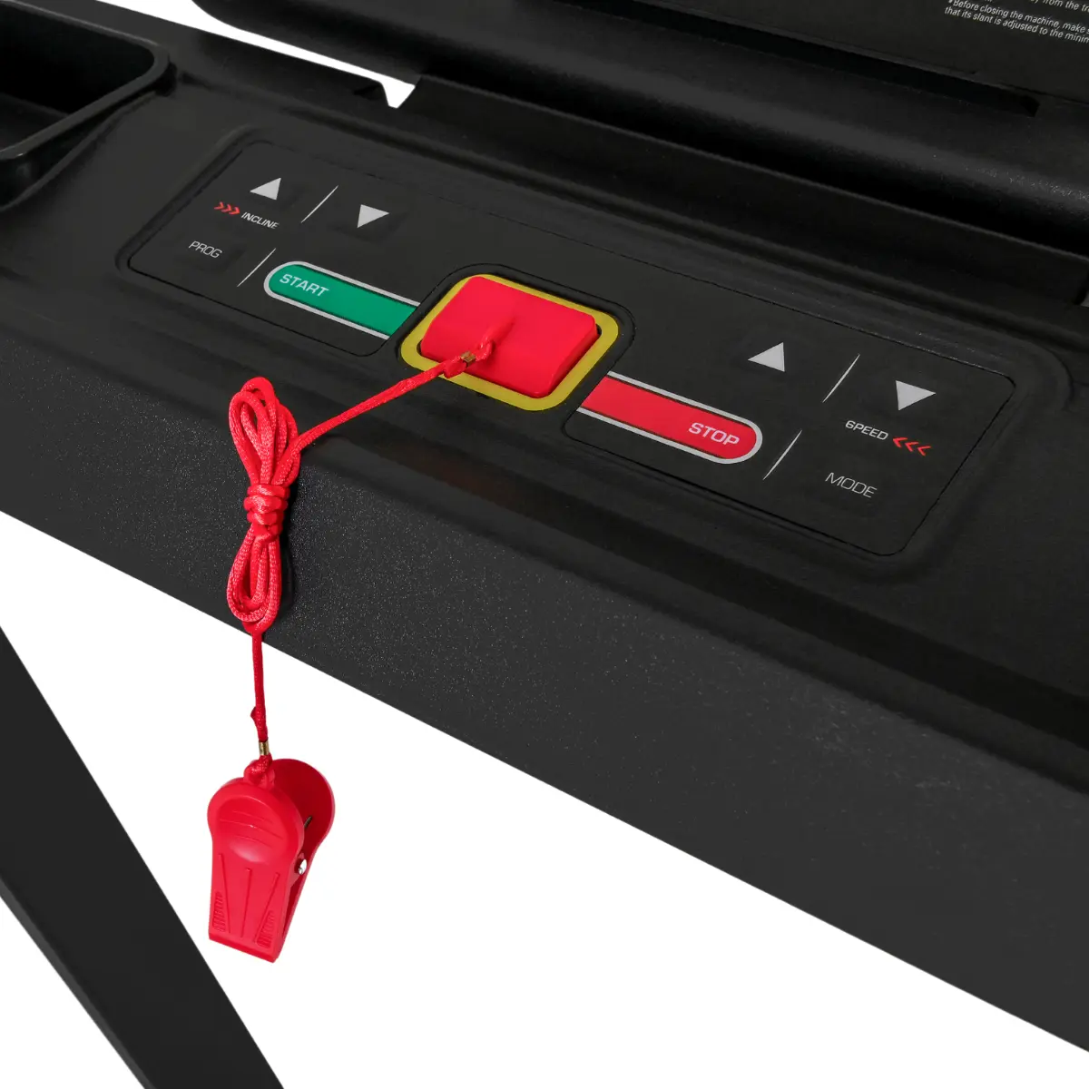 Treadmill control panel with start and stop buttons, and a safety key.