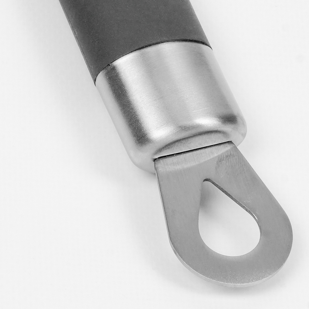 Close-up of a metal handle with a hole at the end and a black rubber grip.