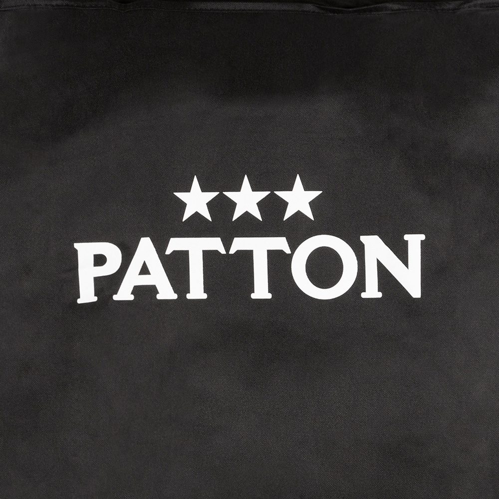 Black bag with white text: PATTON, three stars above. Plain black background.