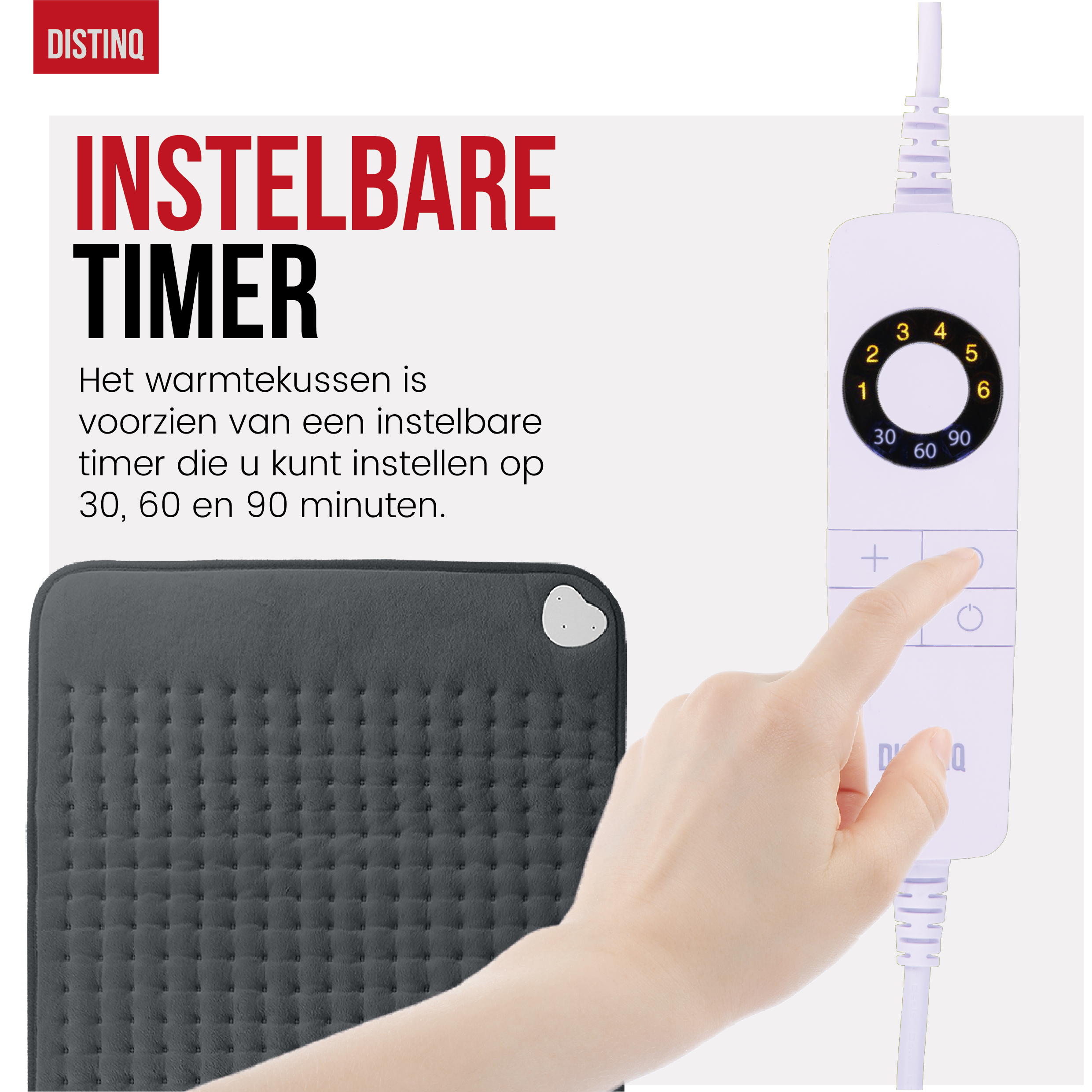 Heated pad with timer controls. Hand touching timer controls. The pad is dark gray.