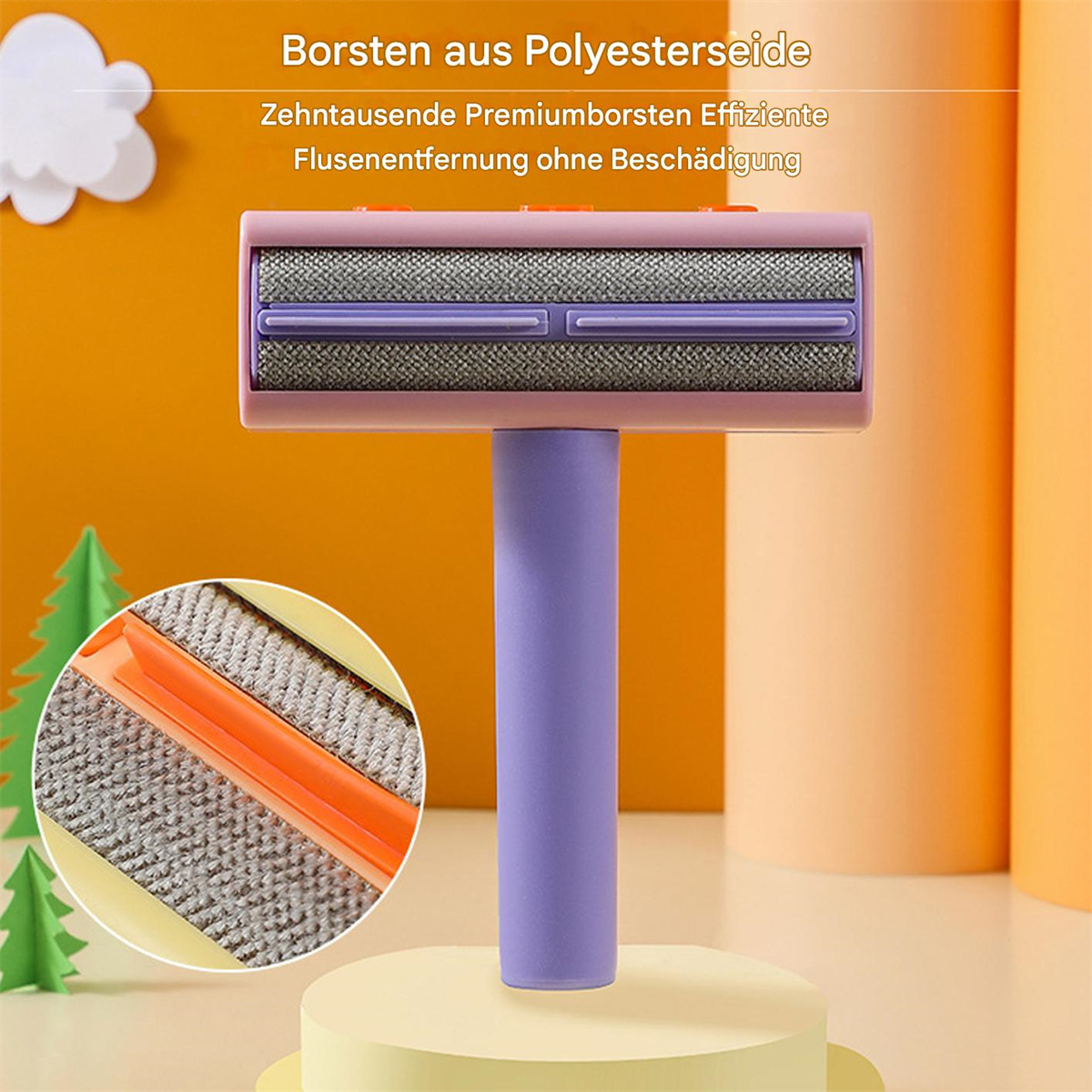 Eine Fusselrolle mit rosa Griff und grauer Rolle. Detail der Fussel.