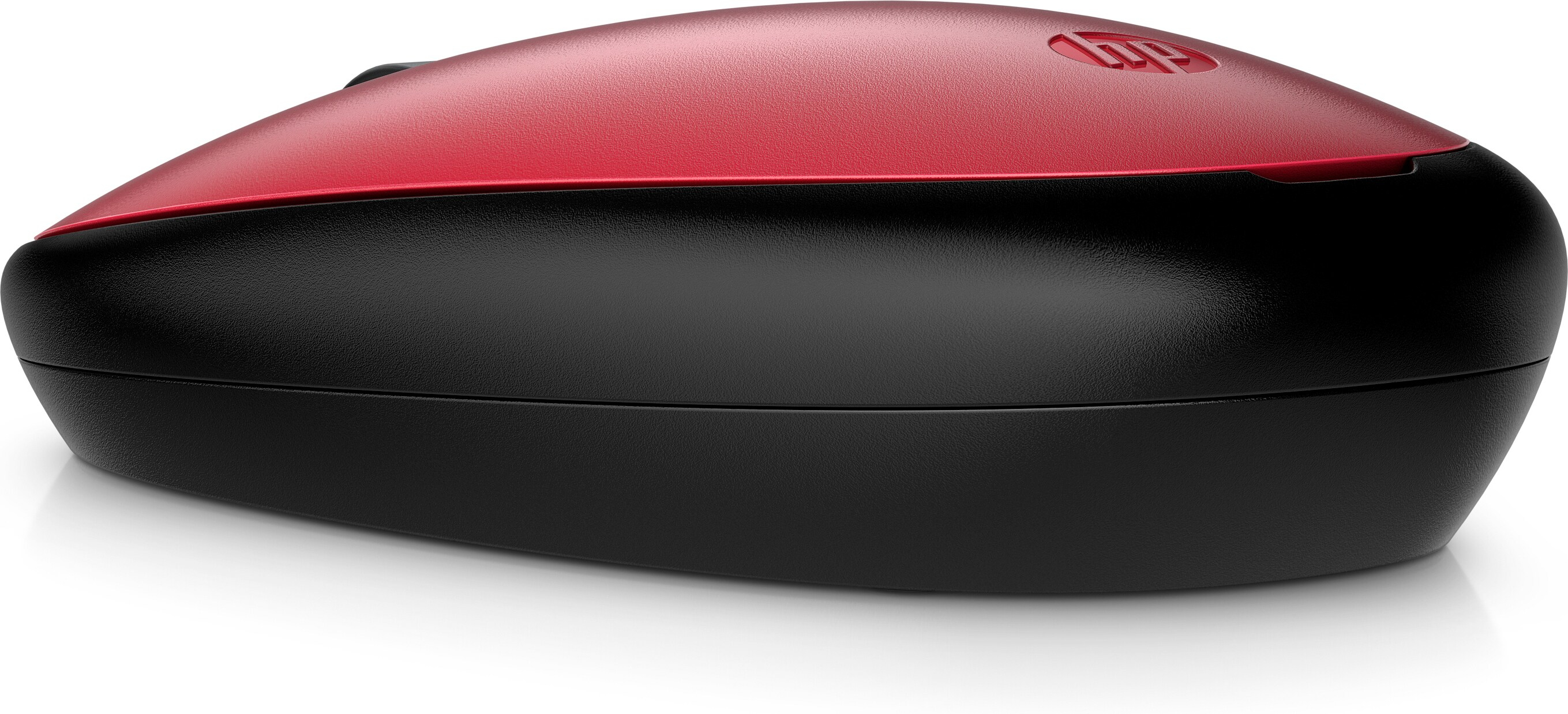 Souris d'ordinateur sans fil rouge et noire, vue latérale. Logo HP sur le dessus.