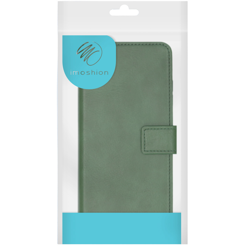 Custodia per telefono verde in una confezione di plastica trasparente. La custodia è chiusa.