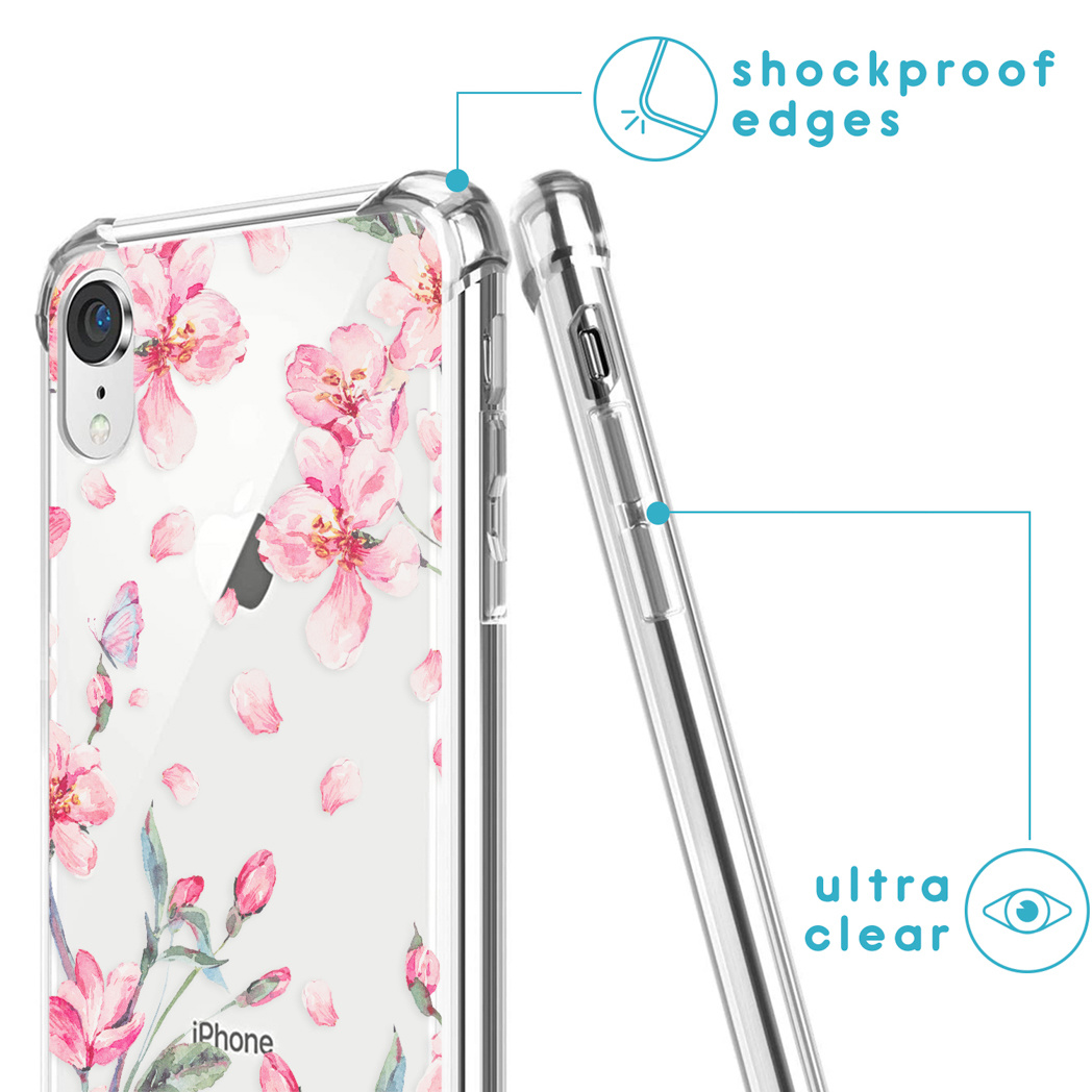 Close-up van een telefoonhoesje met een bloemenontwerp en een iPhone.