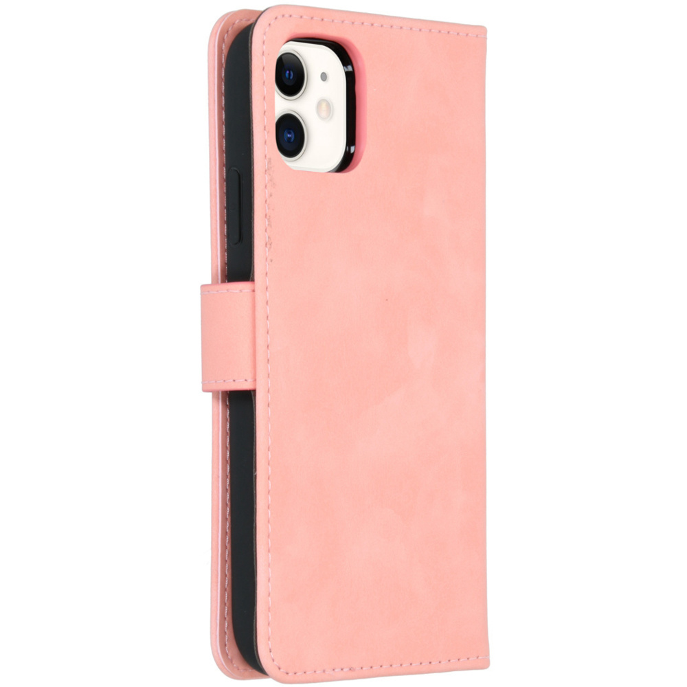 Roze telefoonhoes, open om de telefoonhouder en de achterkant van de telefoon te onthullen.
