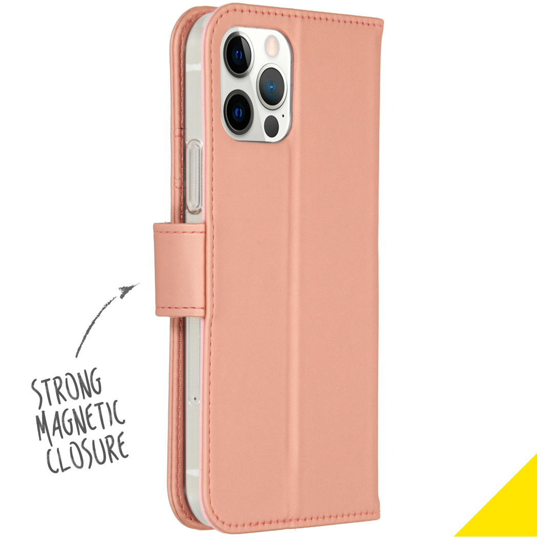 A pink phone case is shown open. The case has a magnetic closure and is strong.