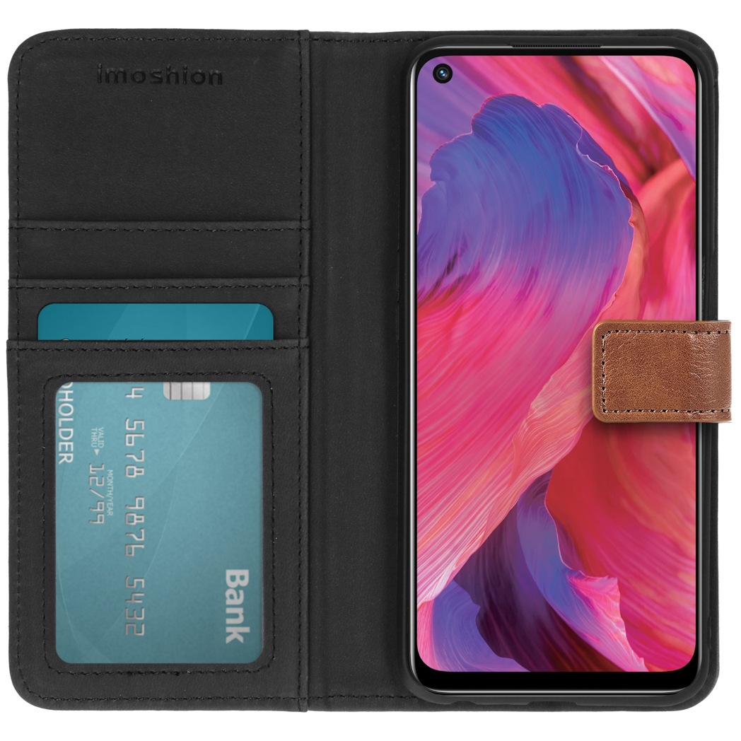 Coque de téléphone ouverte avec carte de crédit et téléphone à l'intérieur. Design sur l'écran.