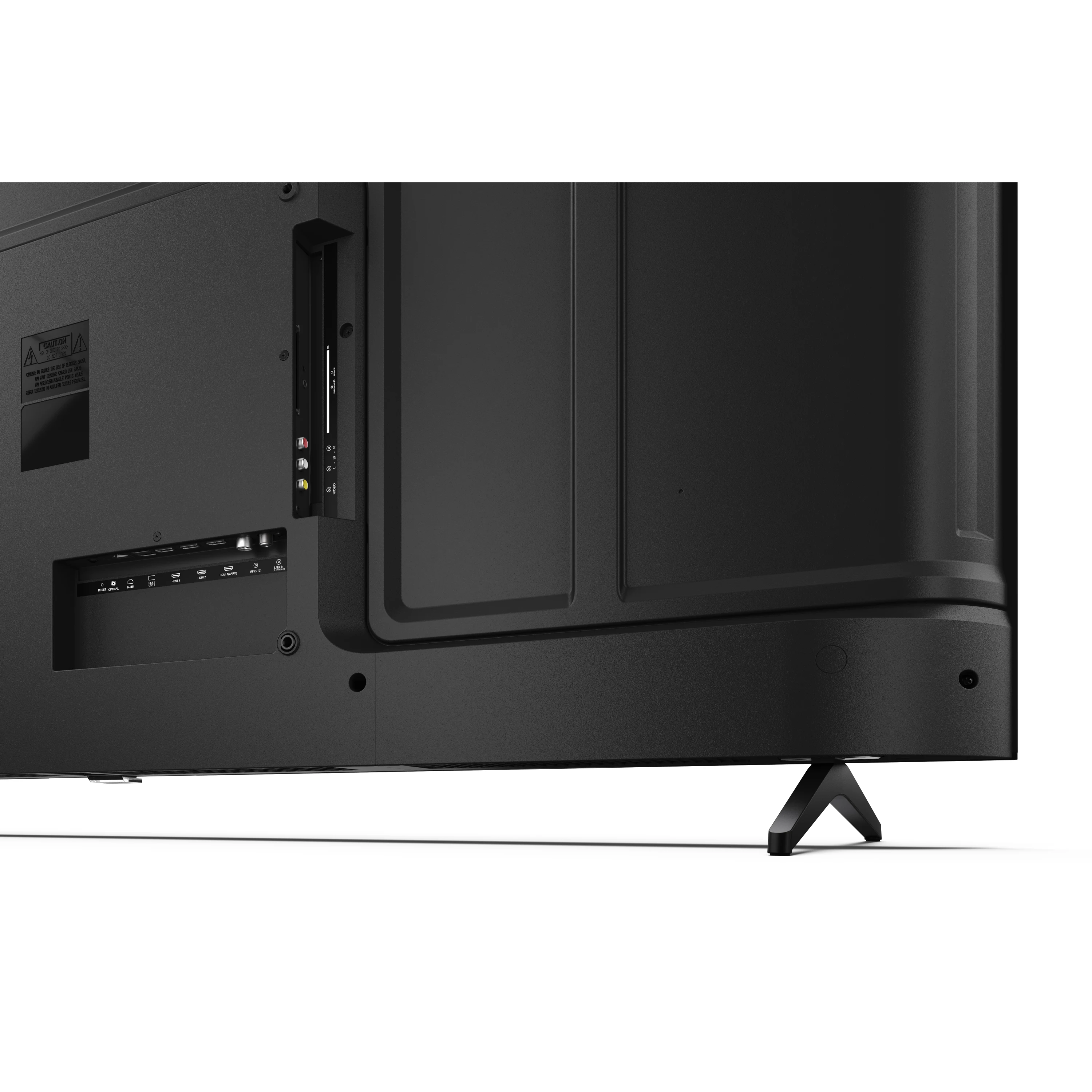Die Rückseite eines schwarzen Fernsehers mit Anschlüssen und Ständer vor weißem Hintergrund.