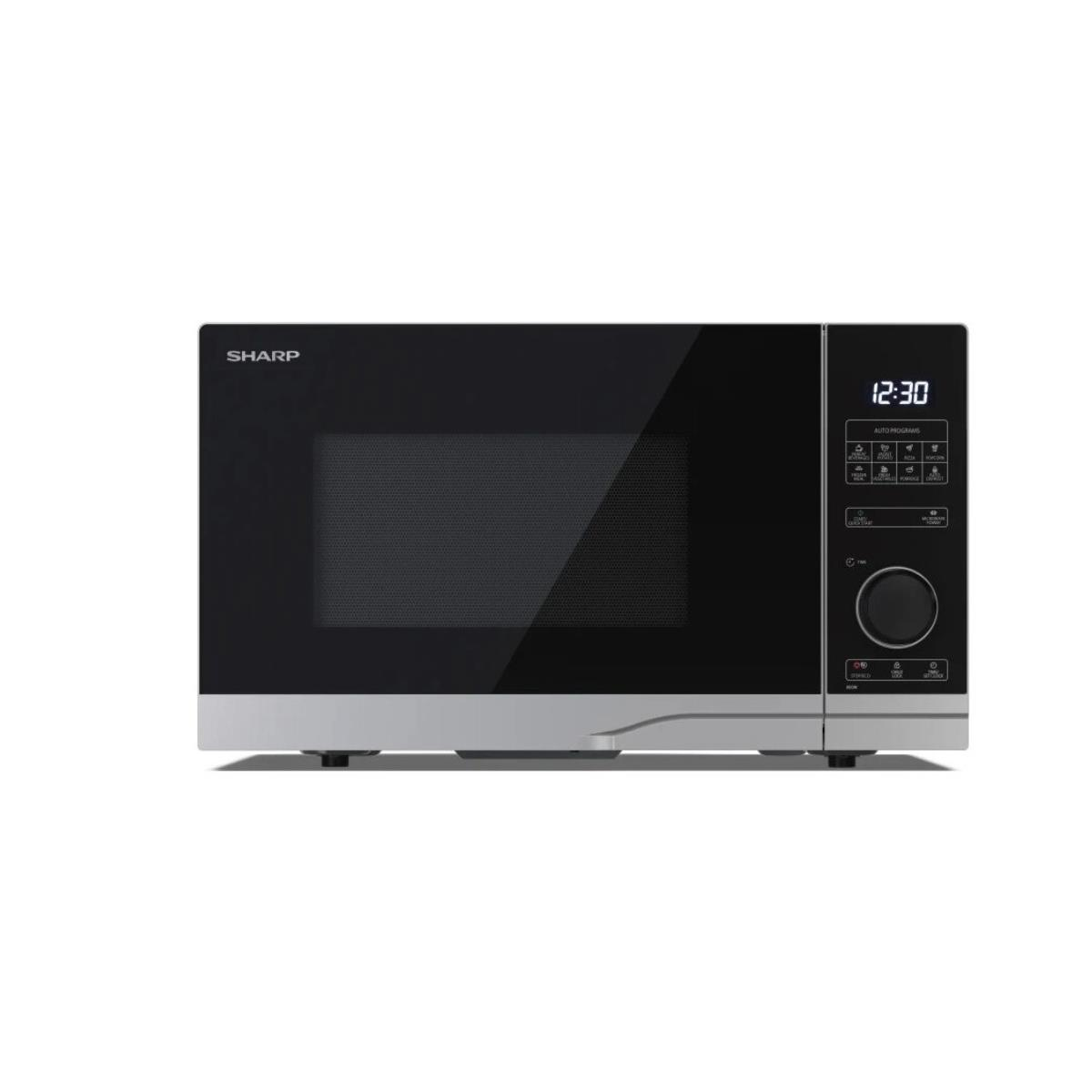 Un forno a microonde Sharp argento e nero con porta nera e orologio digitale che mostra le 12:30.