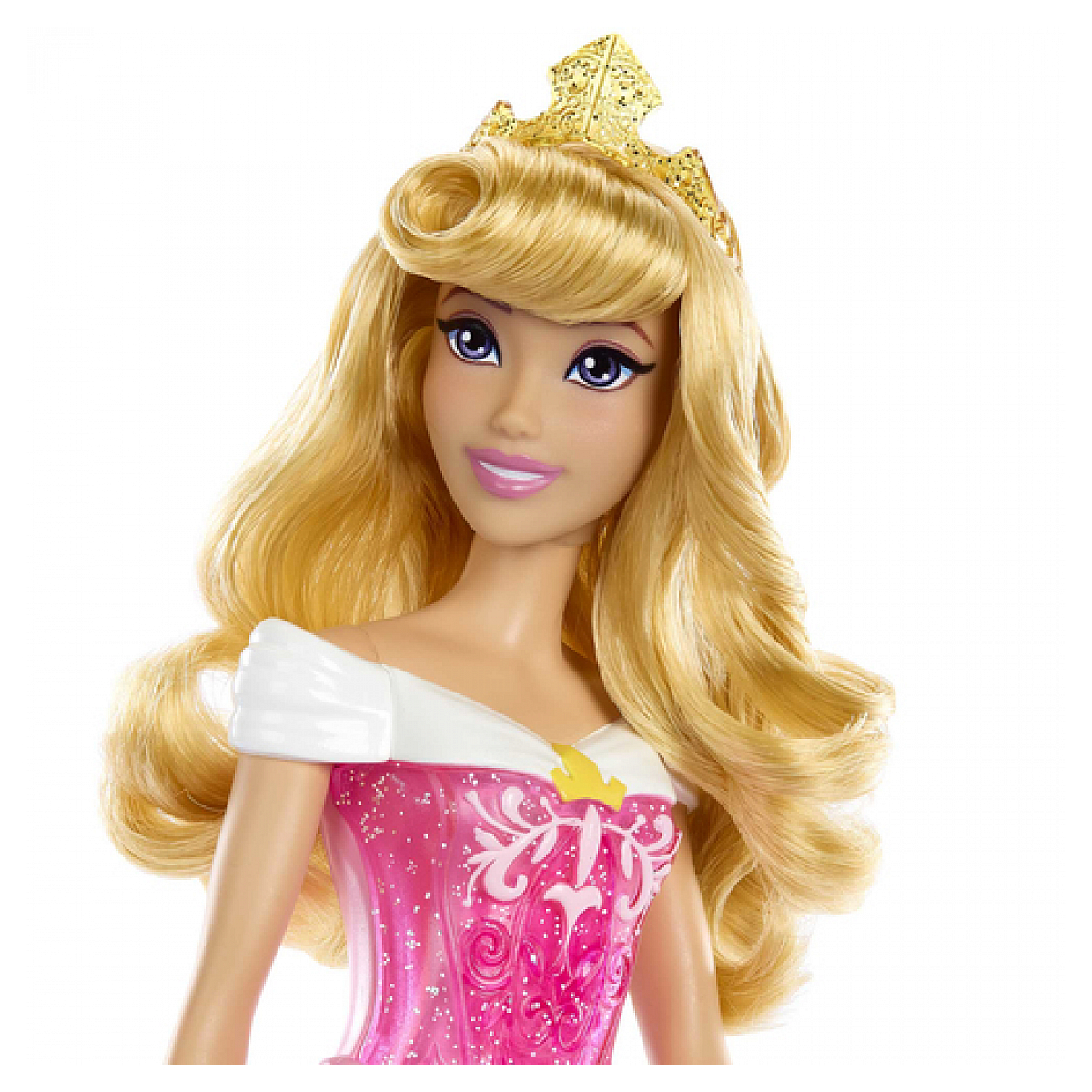 Close-up van de prinses Aurora-pop. Ze heeft blond haar, een gouden kroon en een roze jurk.