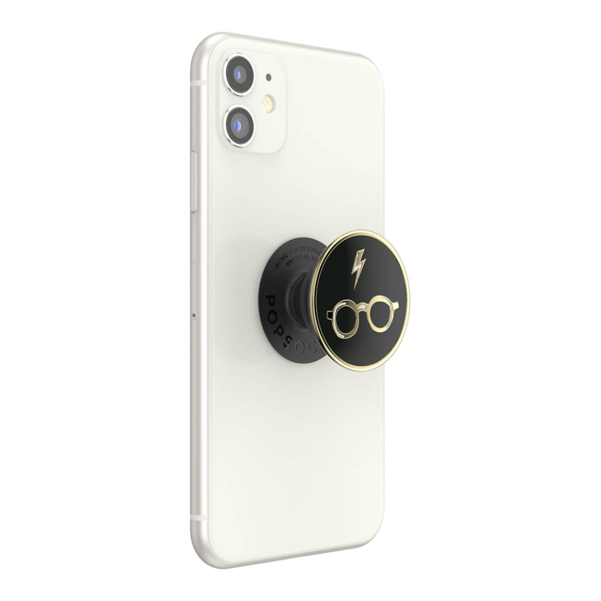 Un telefono bianco con un pop socket di Harry Potter. Ha occhiali e un fulmine.