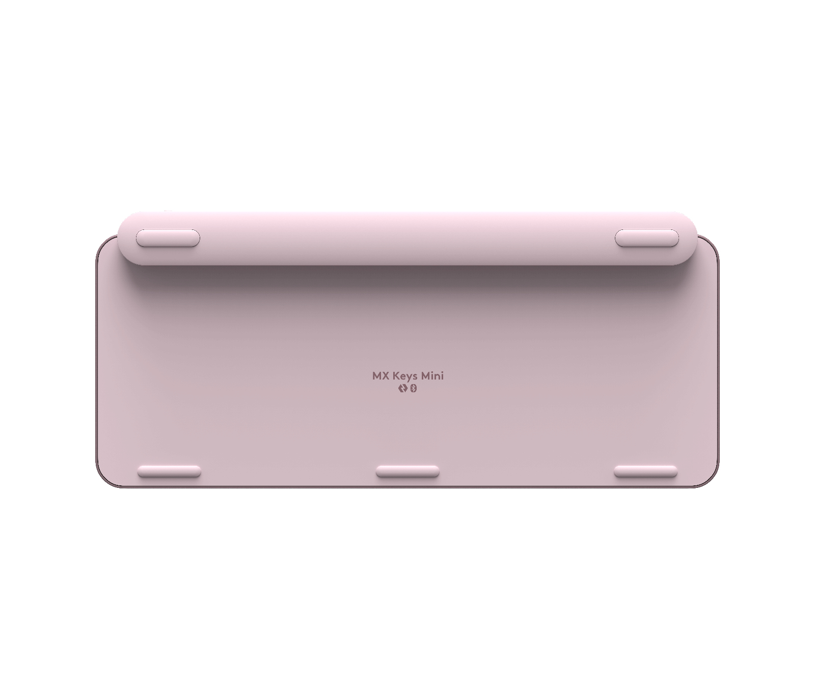 Różowe dno klawiatury, z modelem 'MX Keys Mini'.