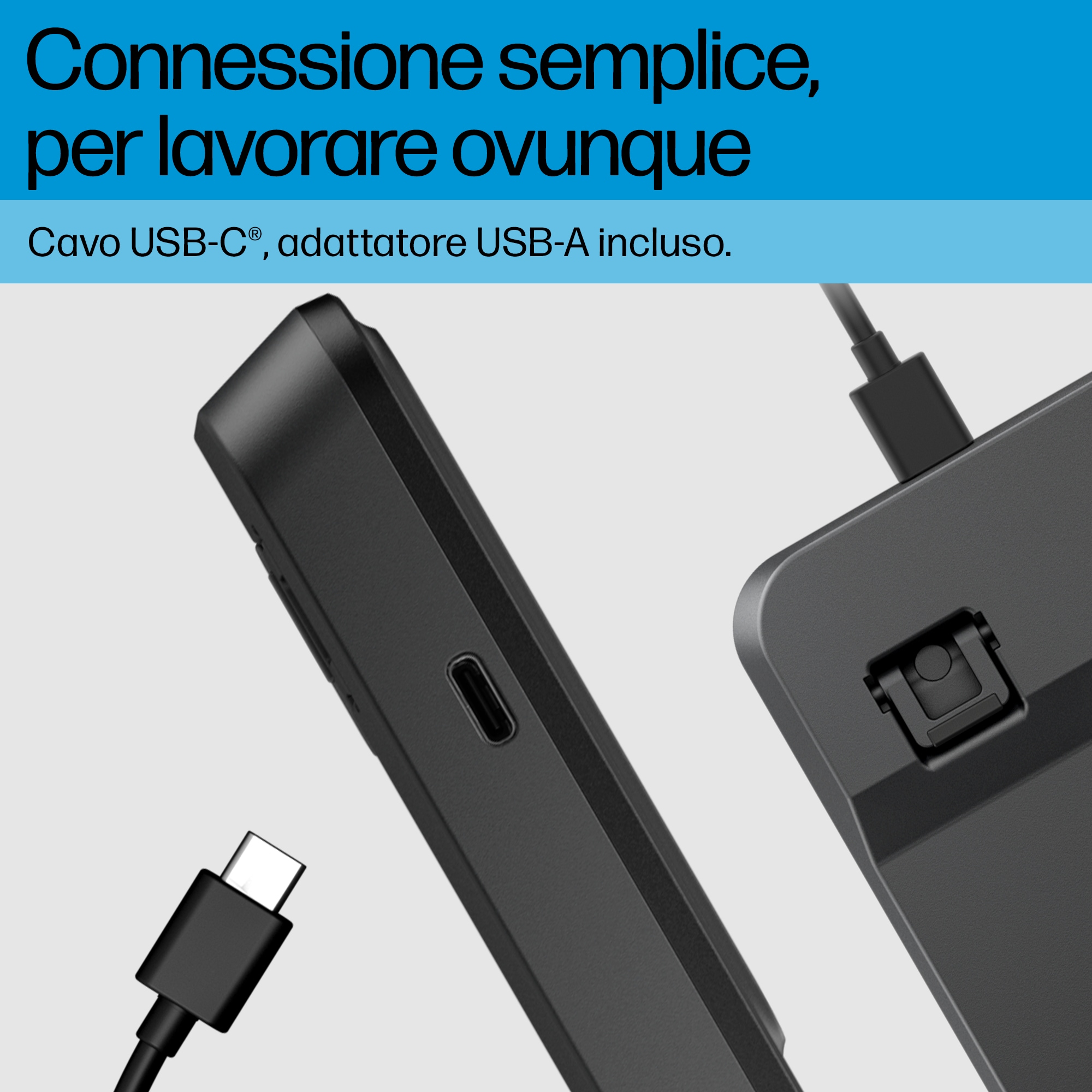 Zbliżenie czarnego urządzenia z podłączonym kablem USB-C, z tekstem u góry.