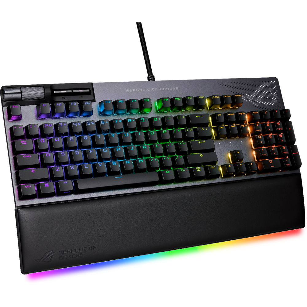 Teclado mecánico retroiluminado con teclas coloridas y reposamuñecas. Dice REPUBLIC OF GAMERS.