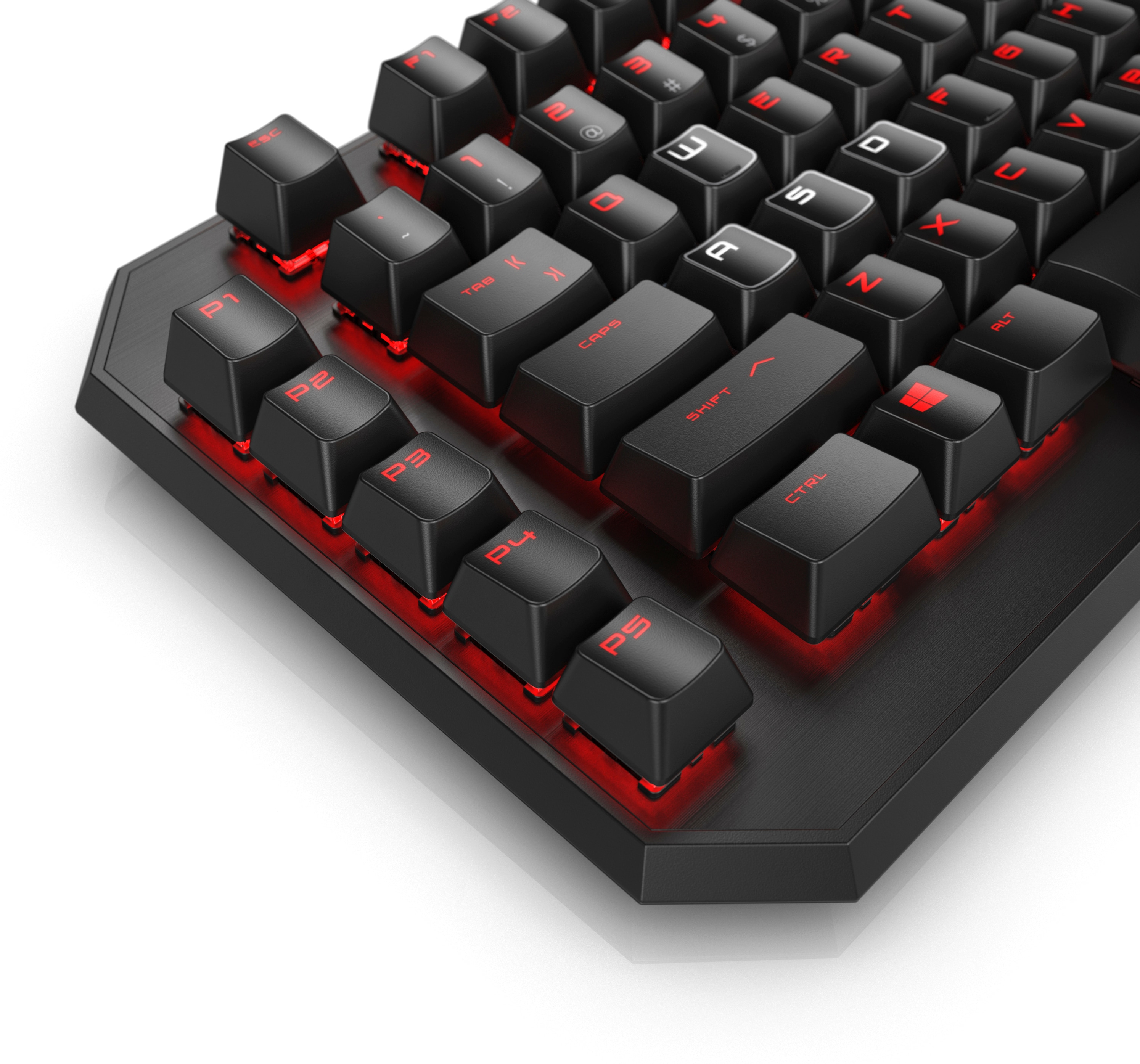 Close-up of a black keyboard with red backlit keys. White background.