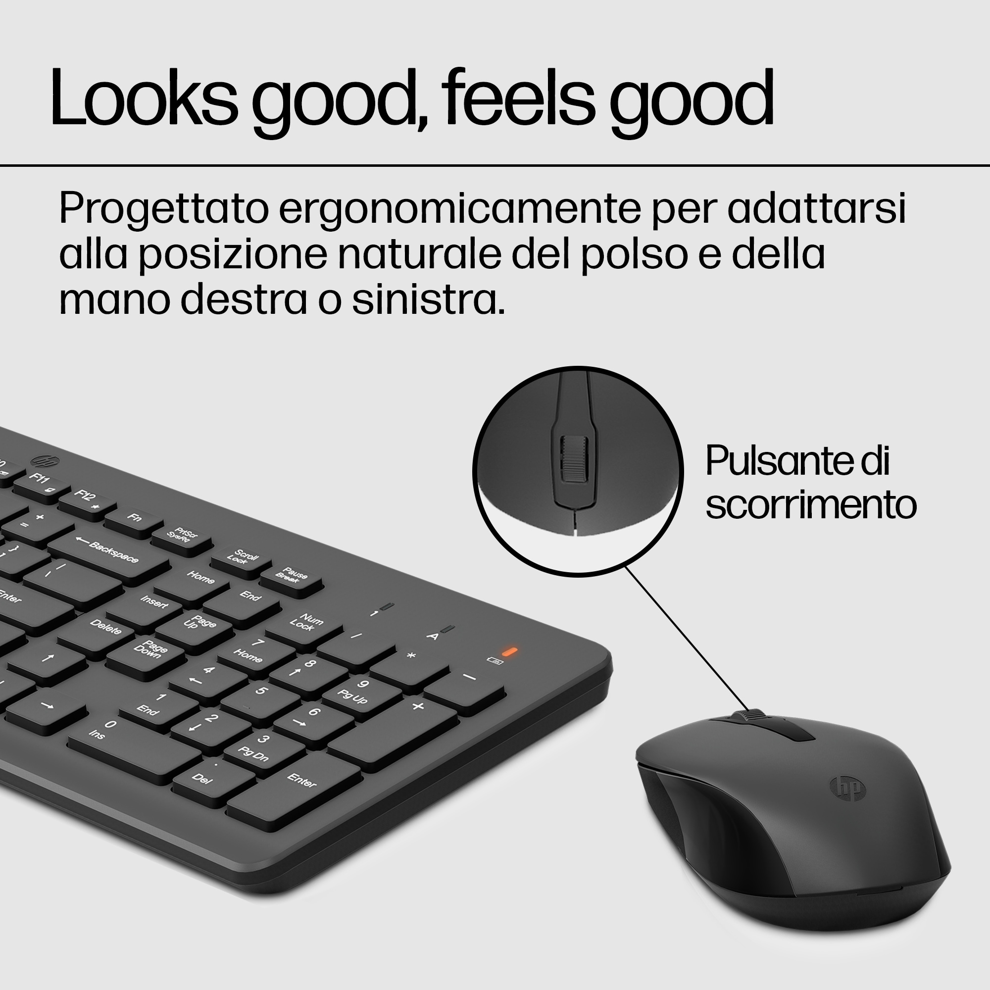 Ratón y teclado de computadora negros. El teclado tiene una función de zoom circular.