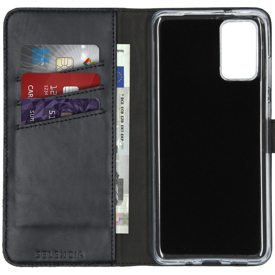 Téléphone dans un étui portefeuille avec cartes et billets en euros. Le logo Selencia est visible.