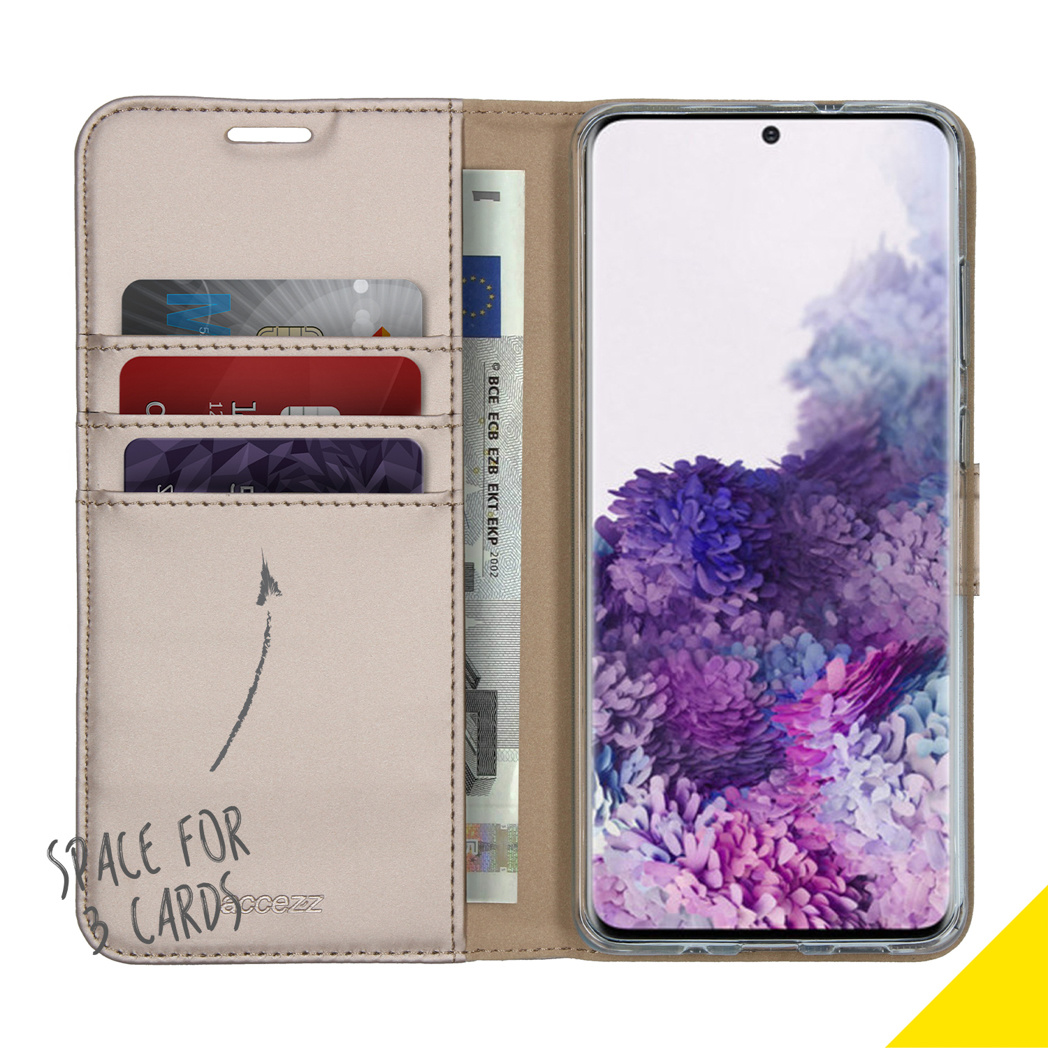 Étui de téléphone ouvert, avec cartes et argent à gauche, téléphone à droite.