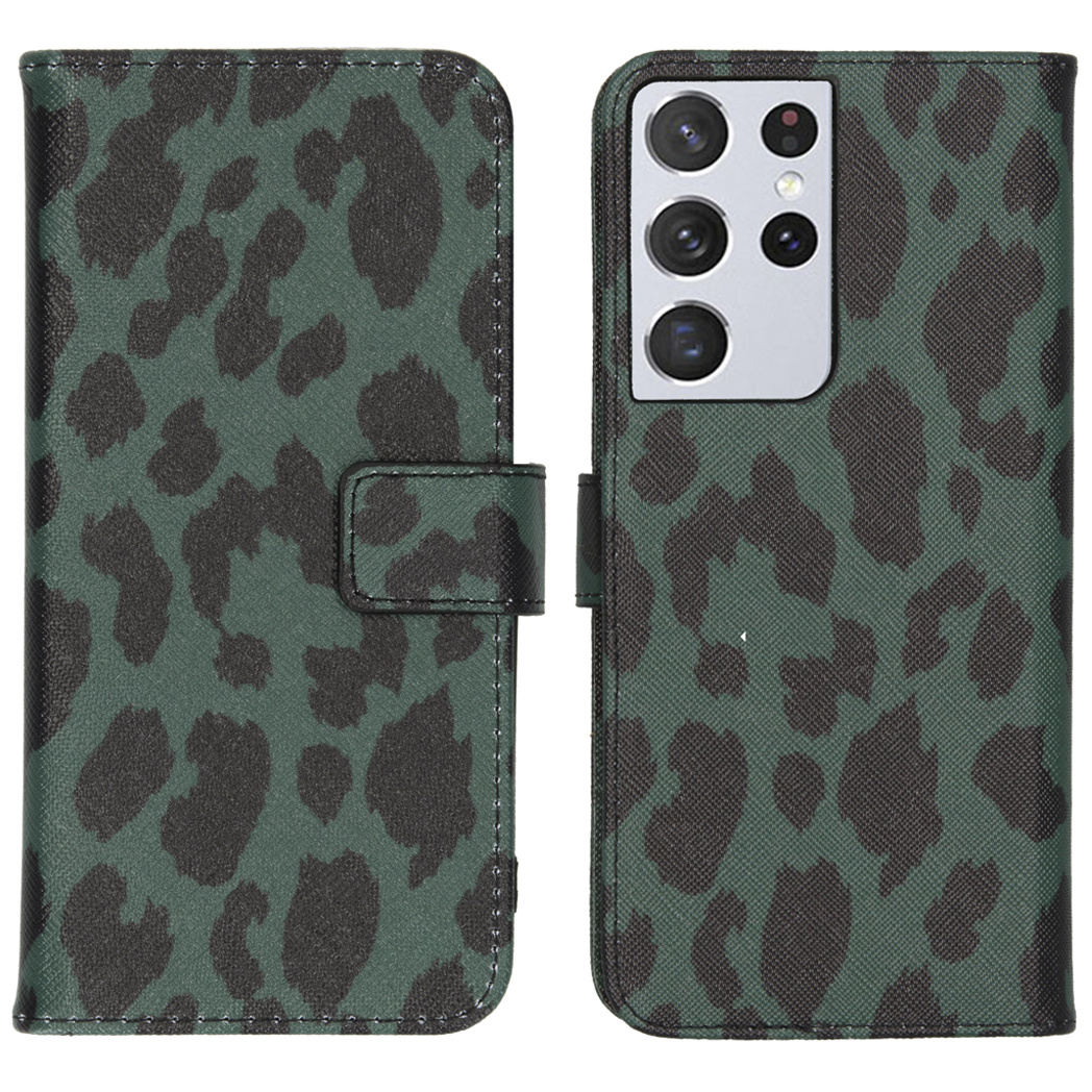 Groen telefoonhoesje met donker vlekkenpatroon open.