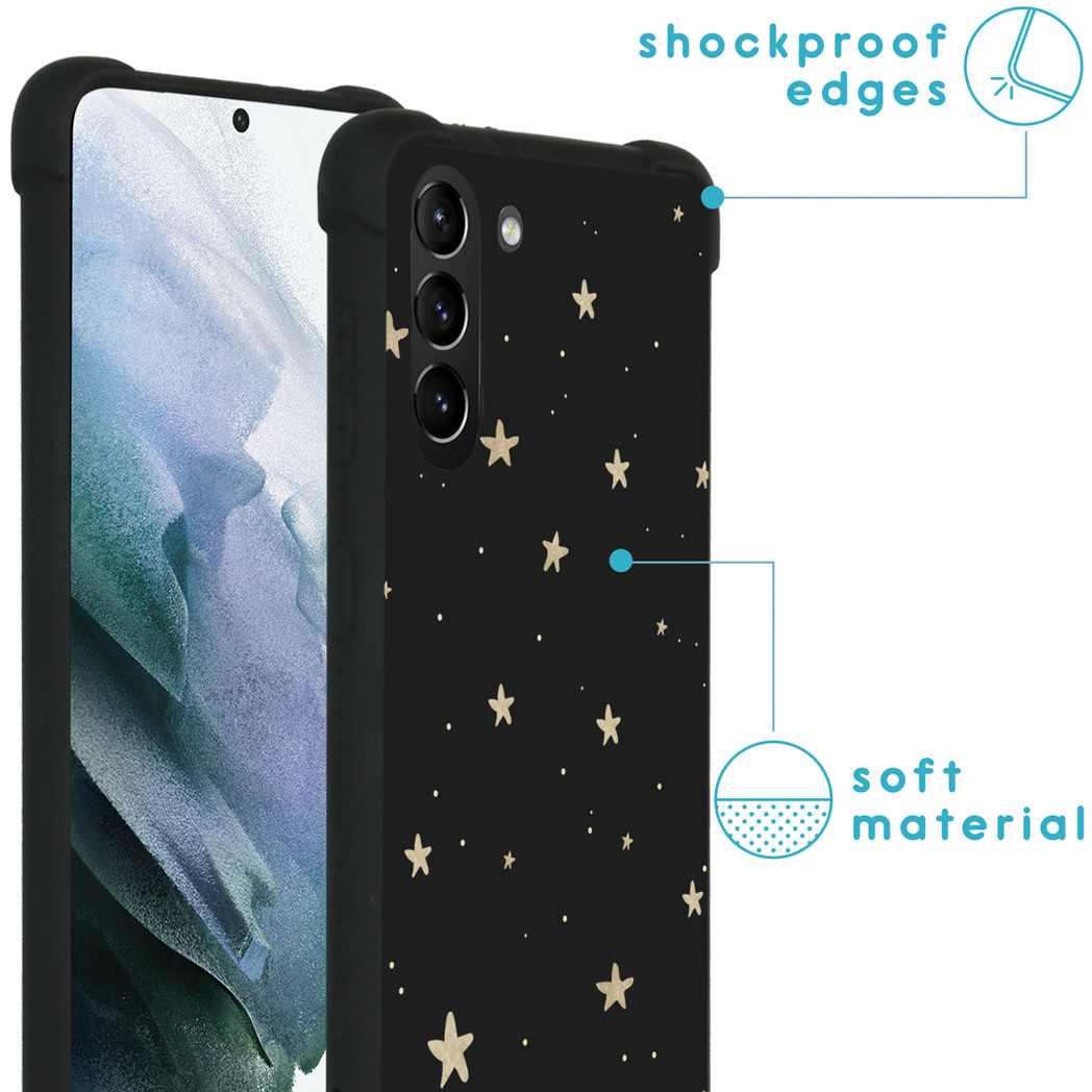 Coque de téléphone noire avec étoiles dorées, bords antichoc et matière souple.