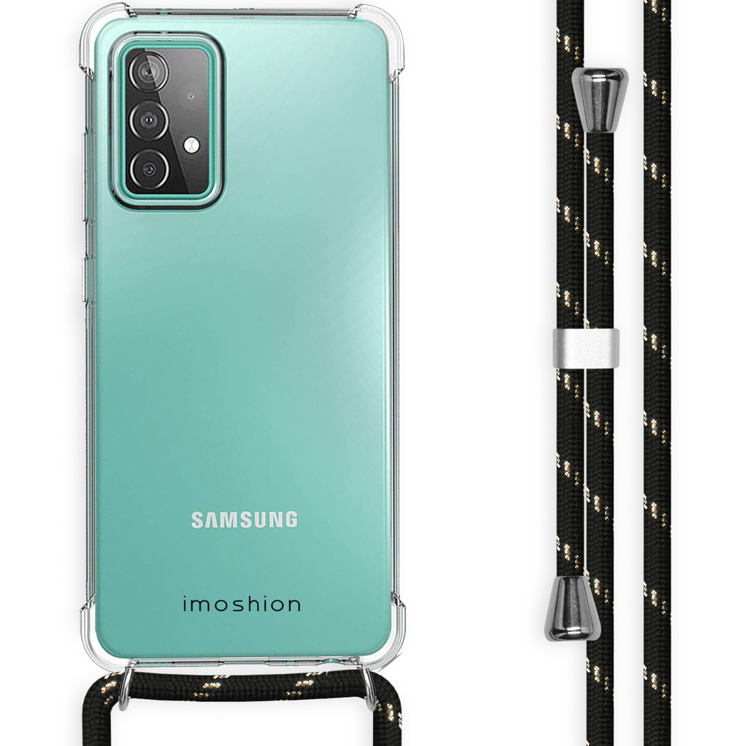 Coque de téléphone transparente avec une sangle noire et dorée. Le téléphone à l'intérieur est vert menthe.